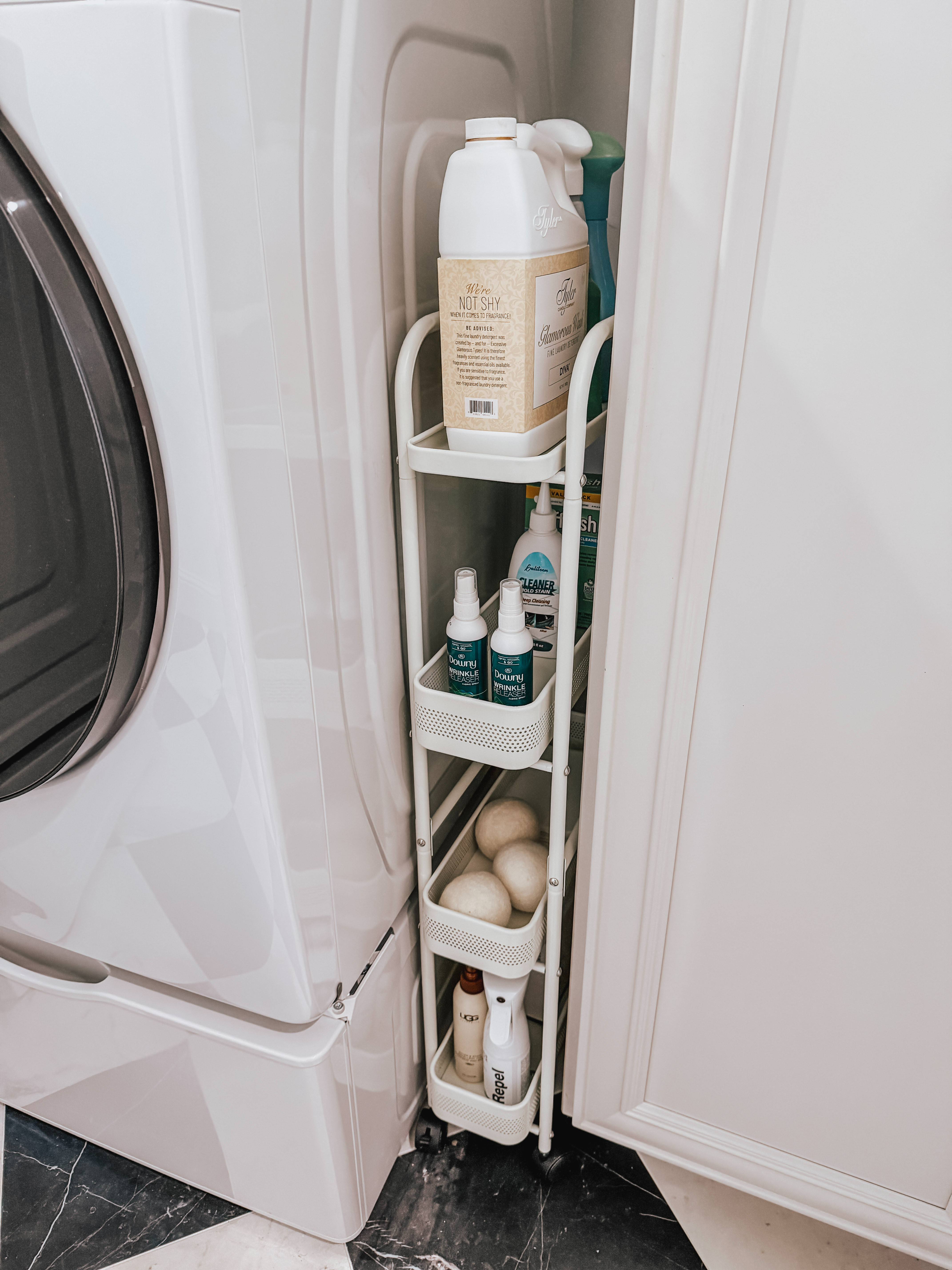 That weird gap finally has a purpose. This slim rolling cart slides into those narrow spaces between appliances and cabinets, turning unused space into extra storage for detergent, dryer sheets, stain removers, and more.
 

 #LTKHome