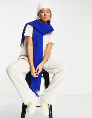 ASOS DESIGN fluffy tassel scarf in cobalt blue | ASOS (Global)