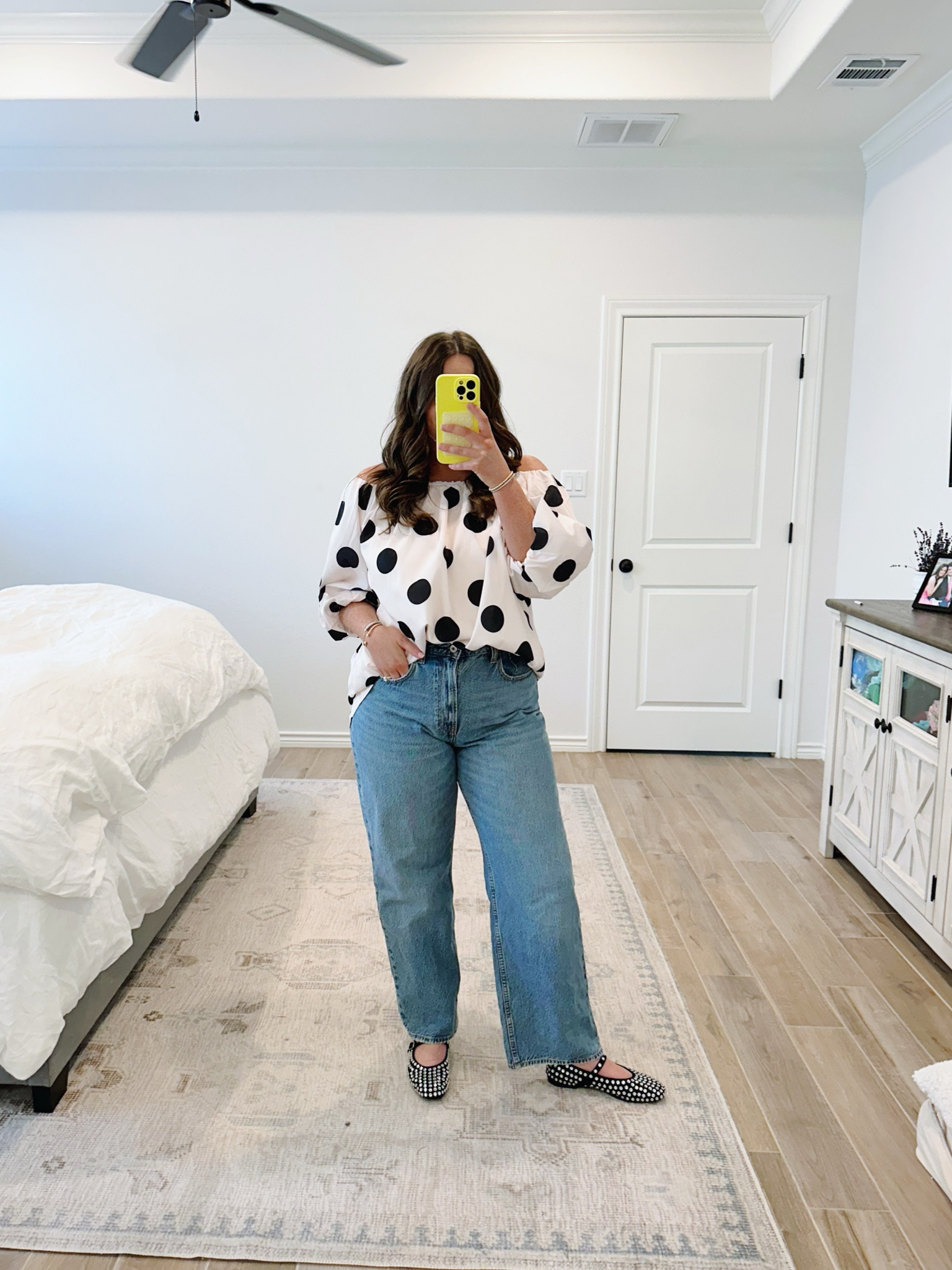 this top is actually a dress but it’s way too short even for my 5’3 self so I am styling it as a top and really like it! wearing a size medium in the top and 31 in the jeans (but the jeans are for sure still snug)! wearing a half size down in the flats! 
