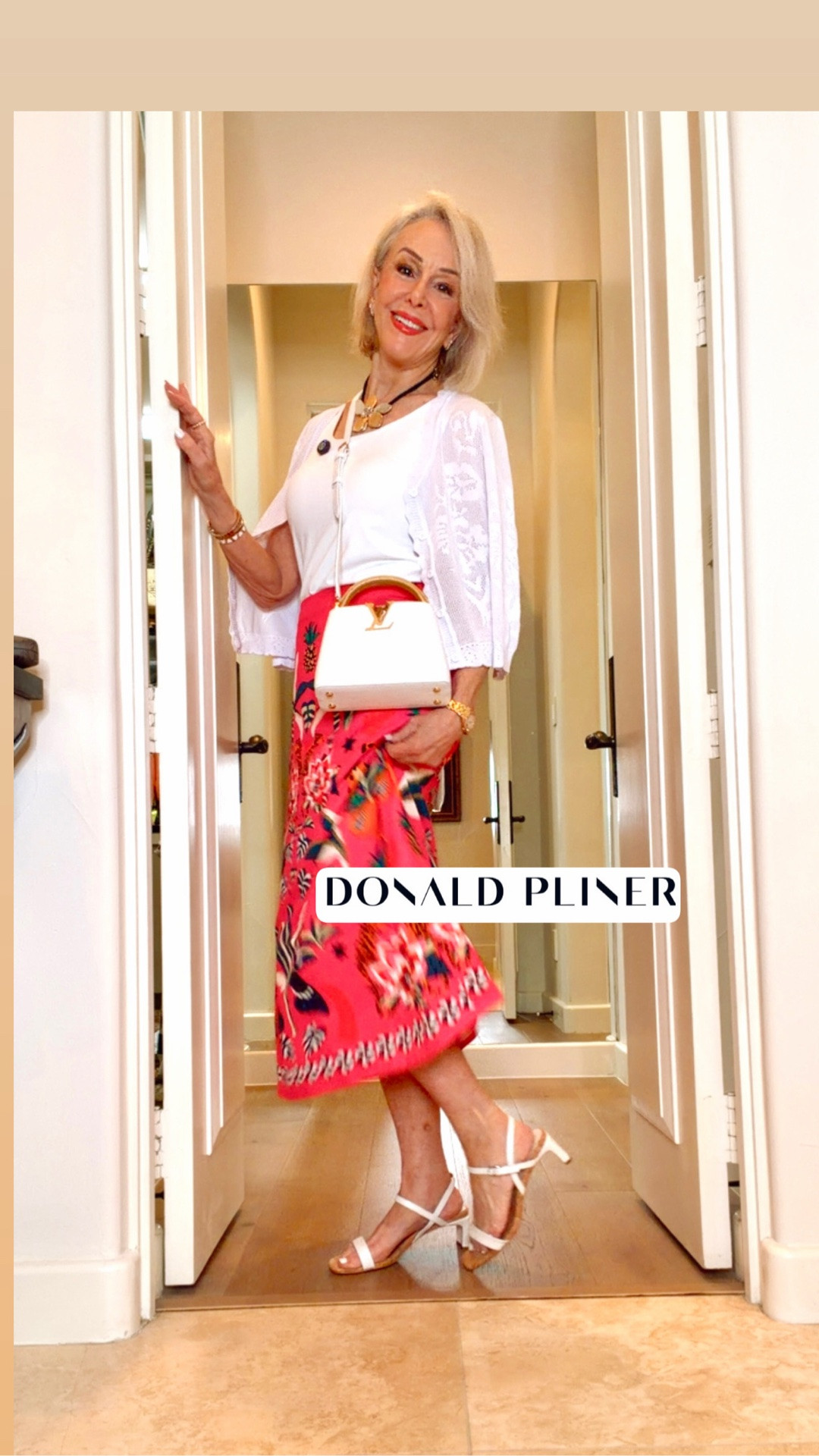 Playful and refined, the BRAZI by Donald Pliner features slim straps and delicate detailing for a timeless look. This modern sandal is lightweight and comfortable for all-day wear.

This skirt is made of soft comfy fabric, which is soft, breathable and durable. Size up. I am wearing a size Medium and I am 5’7” 132 lbs. It is a darling skirt 
Cardigan is great for travel, styling and comfort.

#LTKOver40 #LTKWorkwear #LTKgrwm