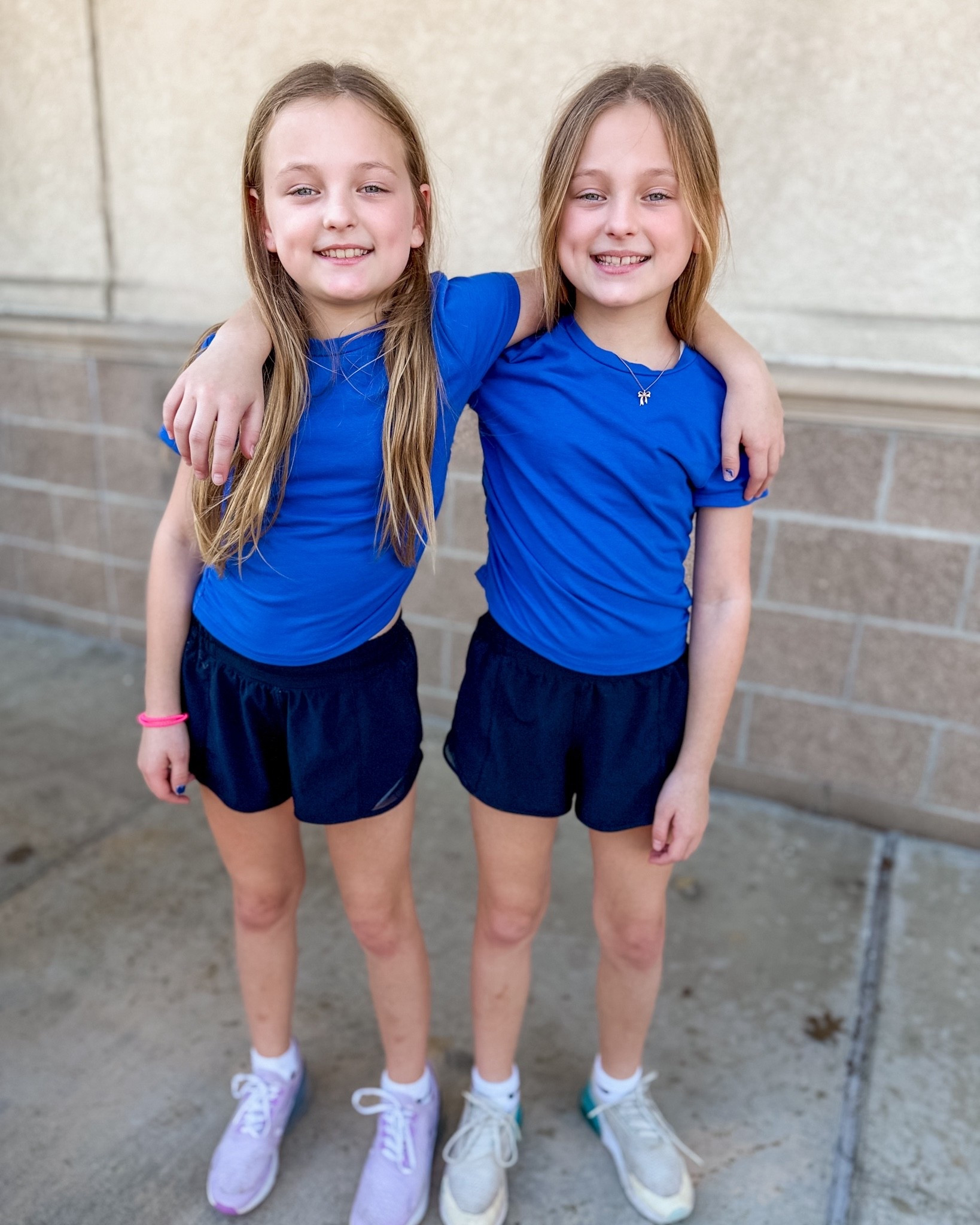 The twins twinning in their LuLulemon shorts - size 0