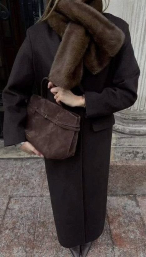 A long brown coat paired with a suede bag and a faux fur scarf creates an effortlessly elegant fall look. The mix of textures adds depth and warmth, while the tonal brown palette feels refined and timeless, perfect for embracing the season in style. 

 #LTKSeasonal #LTKStyleTip #LTKWorkwear