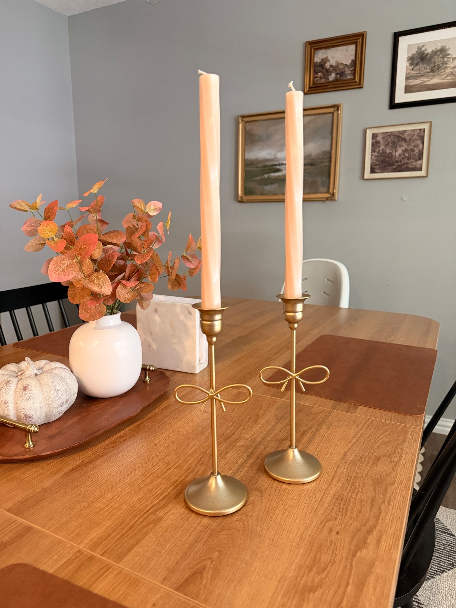 Brass/ gold bow taper candle holders these are the size large! Perfect for holiday hosting✨🫶

#LTKStyleTip #LTKHome #LTKHoliday