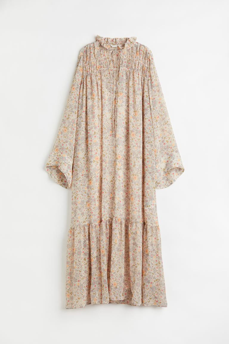 Conscious choice  Long, gently flared dress in airy chiffon. Low, ruffled collar, V-shaped openin... | H&M (US + CA)