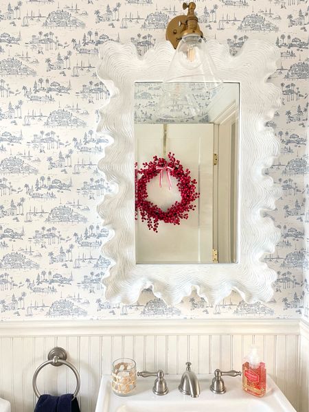 Shop our best selling scallop mirror on sale for Black Friday!! It’s such a beautiful coastal mirror that can work in any space!! ✨ love it in our powder room paired with this Serena & Lily wallpaper! Snag both  on sale now 🙌🏻

#LTKHoliday #LTKCyberWeek #LTKhome