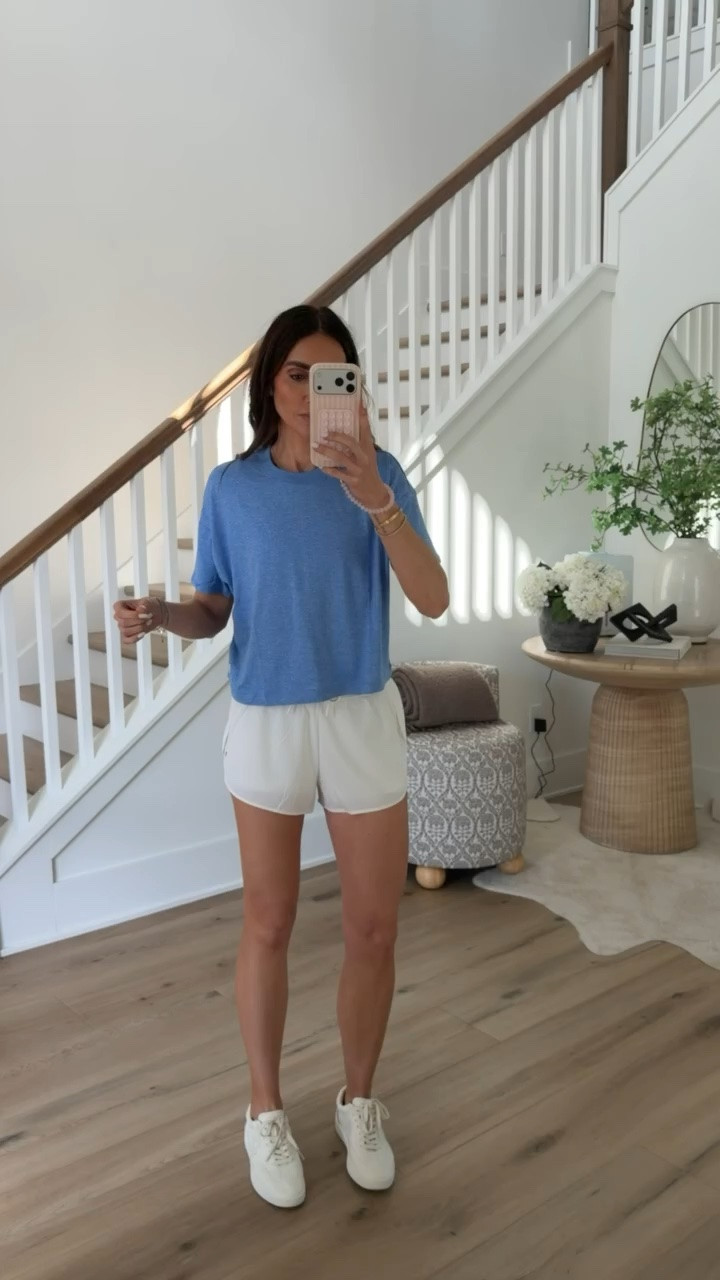 This is one of those easy outfits I keep reaching for all summer. The relaxed blue tee with the white athletic shorts is lightweight, flattering, and perfect for walks, errands, travel days, or casual weekends.

athleisure outfit, workout set, athletic shorts, casual summer outfit, everyday activewear, sporty style, travel outfit, comfy summer look, tennis outfit, white sneakers, annabrstyle

#LTKActive #LTKootd #LTKfitnessgoals