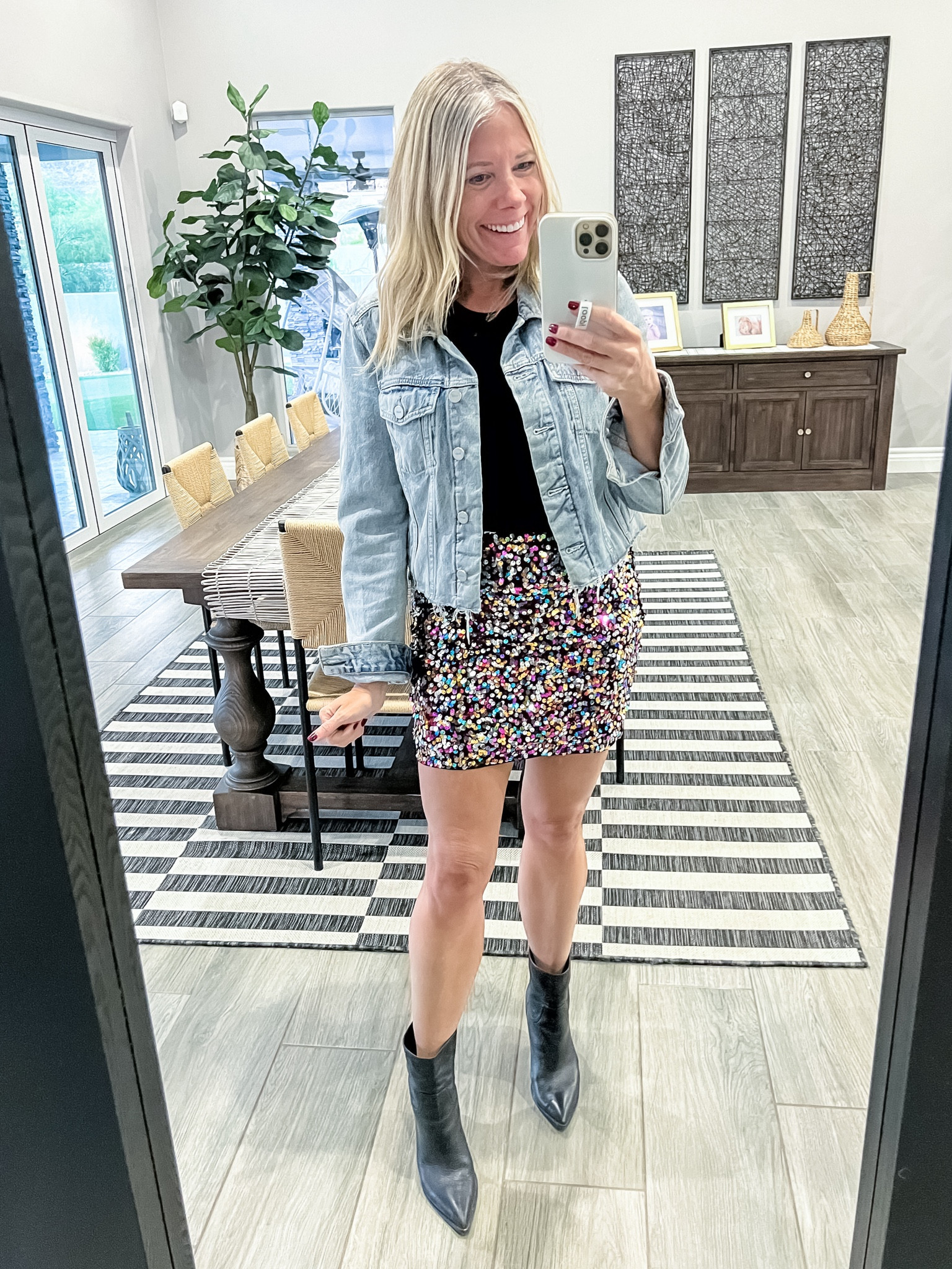 Taylor swift eras concert tour outfit idea sequin skirt (size up runs small, I got the medium) with western style booties, a denim jacket and black tank top Amazon fashion 

#LTKstyletip #LTKfindsunder50 #LTKSeasonal