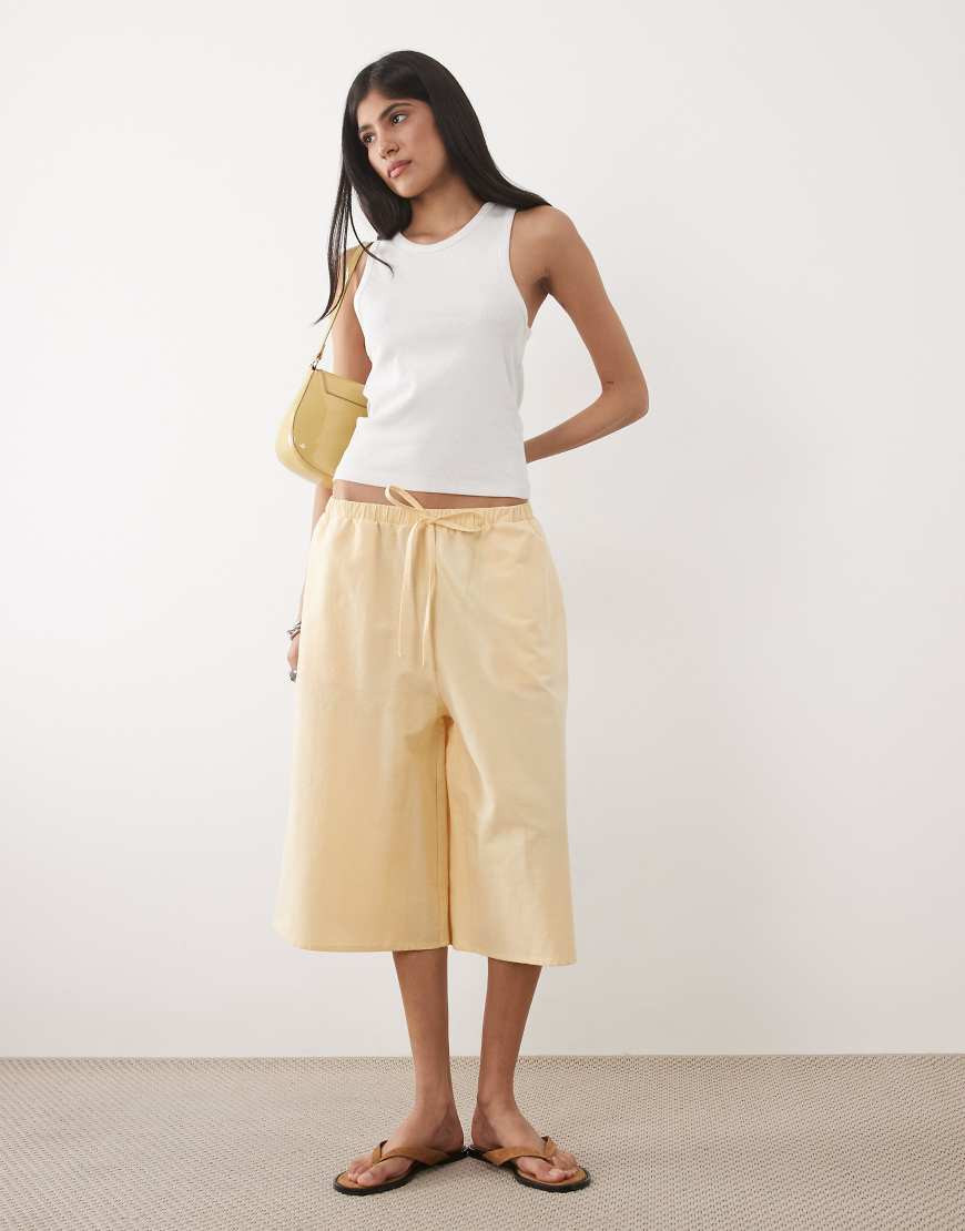 ASOS DESIGN long line linen look bermuda shorts in buttermilk-Yellow | ASOS (Global)