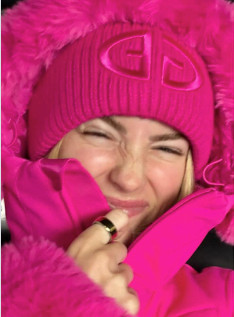 Hannah St. John Winter Ski Style | 18 February 2026
Pink on pink perfection. Hannah St. John stepped out in a luxe après-ski moment wearing the Goldbergh Angele Ski Suit Faux Border in Pink paired with the matching Valerie Beanie. The fitted silhouette and faux trim detailing give this ski look a high-fashion edge, proving winter sportswear can be both performance-ready and polished. She finished the look with her Oura Ring in Gold for that subtle, everyday luxury touch. 

 