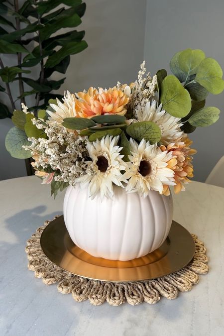 DIY Pumpkin Centerpiece 🎃🌸 This arrangement would be perfect to make for Thanksgiving to use as a centerpiece on the table or on a buffet/console table!

Fall diy, fall centerpiece, fall decor, fall decor diy, pumpkin diy, pumpkin craft, thanksgiving diy, thanksgiving decor, thanksgiving table

#LTKhome #LTKSeasonal