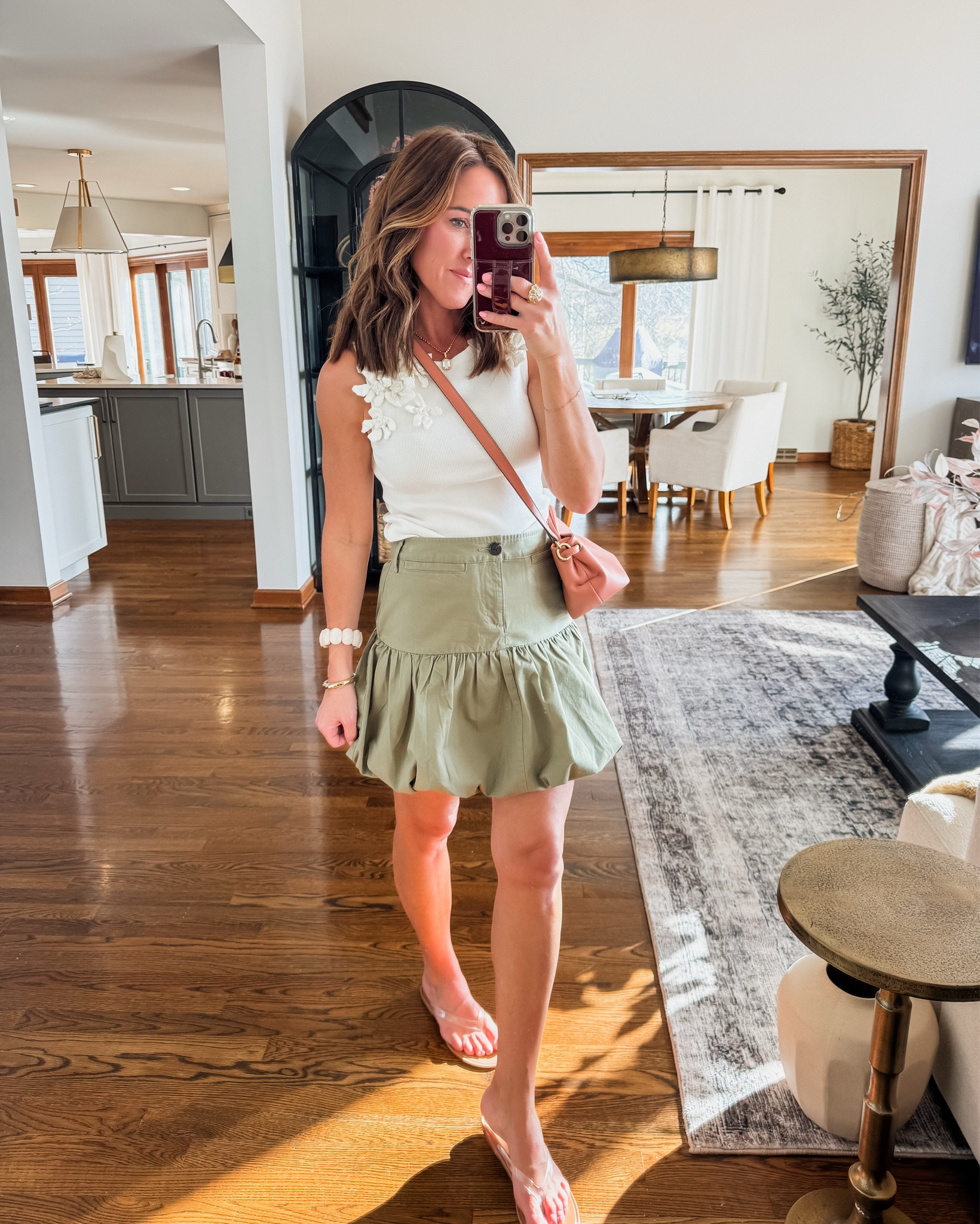 Bubble hem skirt. Runs big. Size down one. I have the xs and the waist is a little too big for me. Elastic back. 
XS tank 

#LTKOver40 #LTKSeasonal