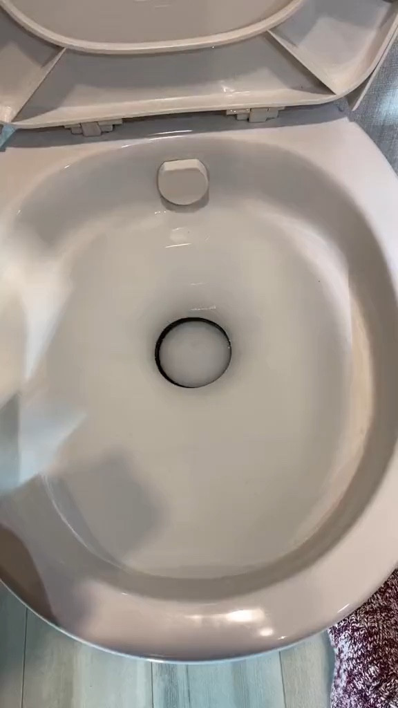 How do we use the toilet in the RV? These are the sewer hoses, holding tank treatment and the racks the hoses sit on that we use in our camper 