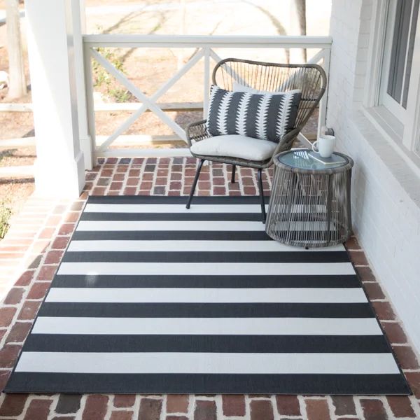 Gonsalez Striped Black/Off-White Indoor / Outdoor Area RugSee More by Highland DunesRated 4.8 out... | Wayfair North America