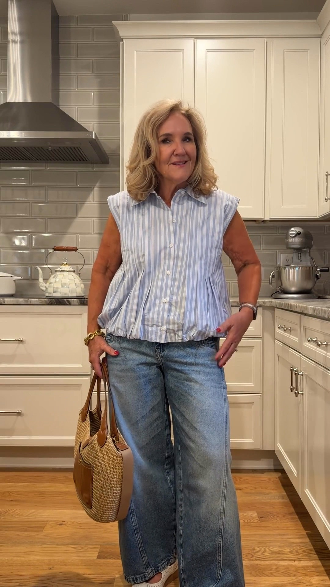 This Anthropologie blouse and jeans are such a great everyday combination! The blouse has an easy, relaxed fit, and the petite jeans are so flattering. I’m wearing a medium in the blouse and a 29 Petite in the jeans. The jeans are a little snug, so I’d recommend sizing up if you’re between sizes. My woven tote is 10% off with code NANETTE, and I’ll also link my Electric Picks earrings. A few of my Julie Vos pieces are from the sample sale.

💡 LTK MADE EASY
❤️ Heart = Support my posts
🔖 Save = Get sale & restock alerts
📋 Lists = Keep favorites organized
📲 Share = Send to yourself for later
💬 Comment = Ask me anything