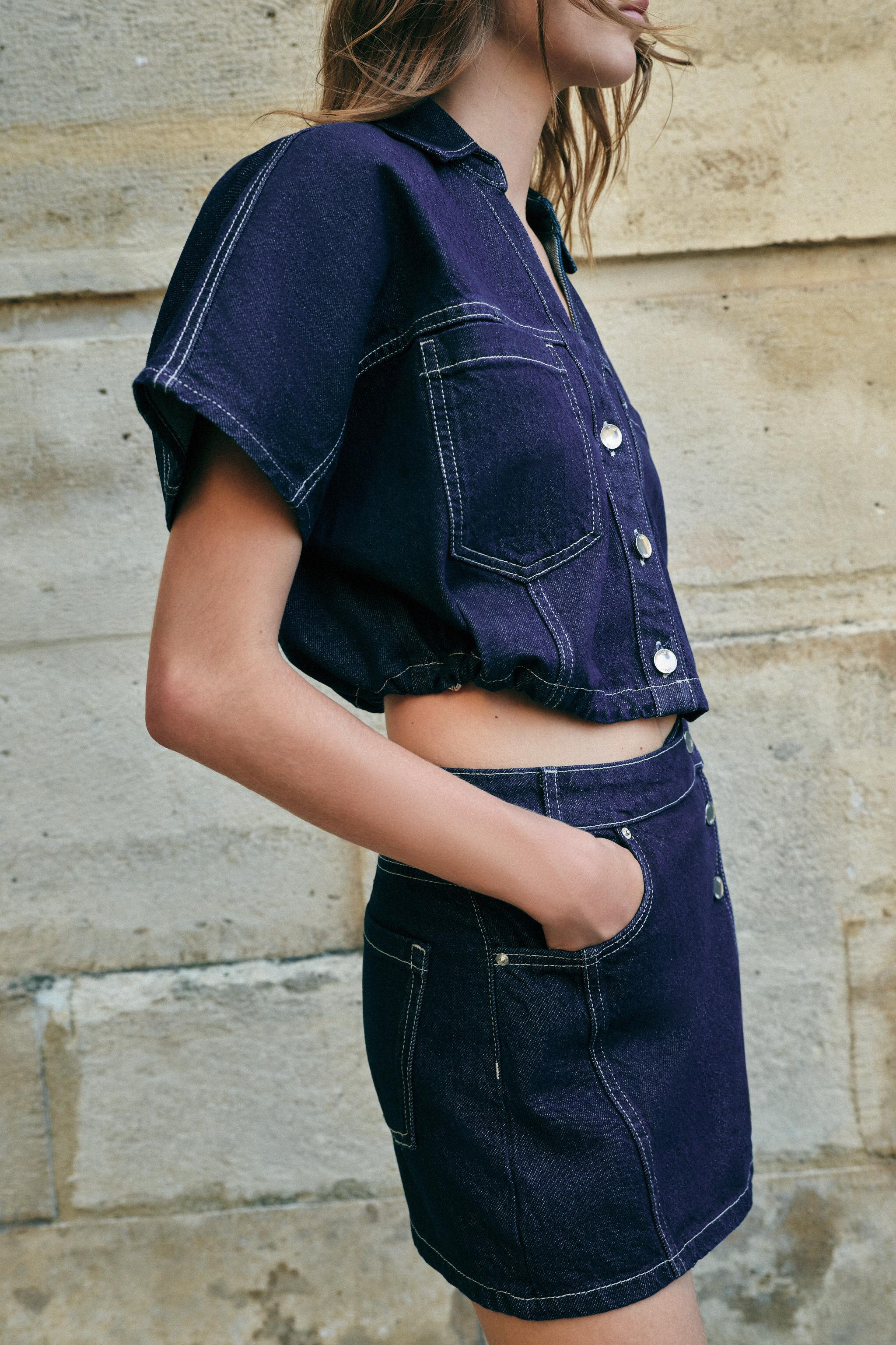 Skort with a wrap front. Front pockets and patch pockets on the back. Front closure with a hidden... | Zara US