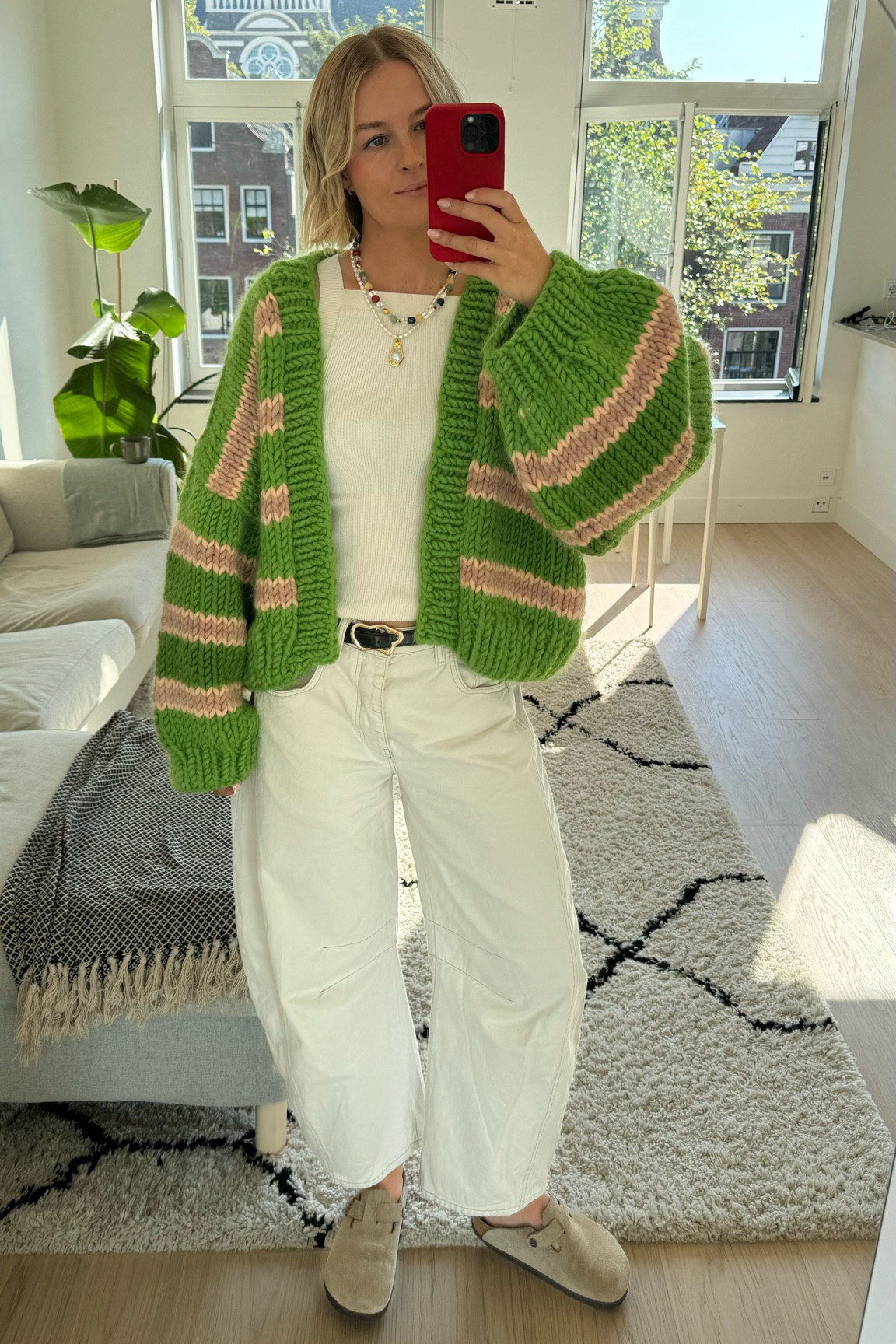 Casual sunny autumn day outfit!

Green chunky jumper: YAN the brand (one size) linked alternatives 
Cream barrel leg jeans: free people (sized down to a 27, but could’ve sized down 2x to 26)
Cream knitted tank: & other stories (S)
Belt: & other stories 
Shoes: Birkenstock Boston Taupe (true to size)
Necklaces: GabsLuk

#FashionMonth #LTKautumn #LTKuk