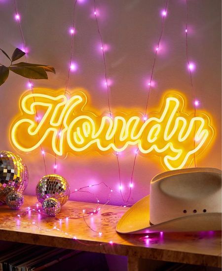 Greet your guests with Western style when you display this howdy-shaped neon sign featuring a groovy, curved font. Backed with acrylic that easily mounts to the wall. Available exclusively at Urban Outfitters.

#LTKhome #LTKFind #LTKstyletip