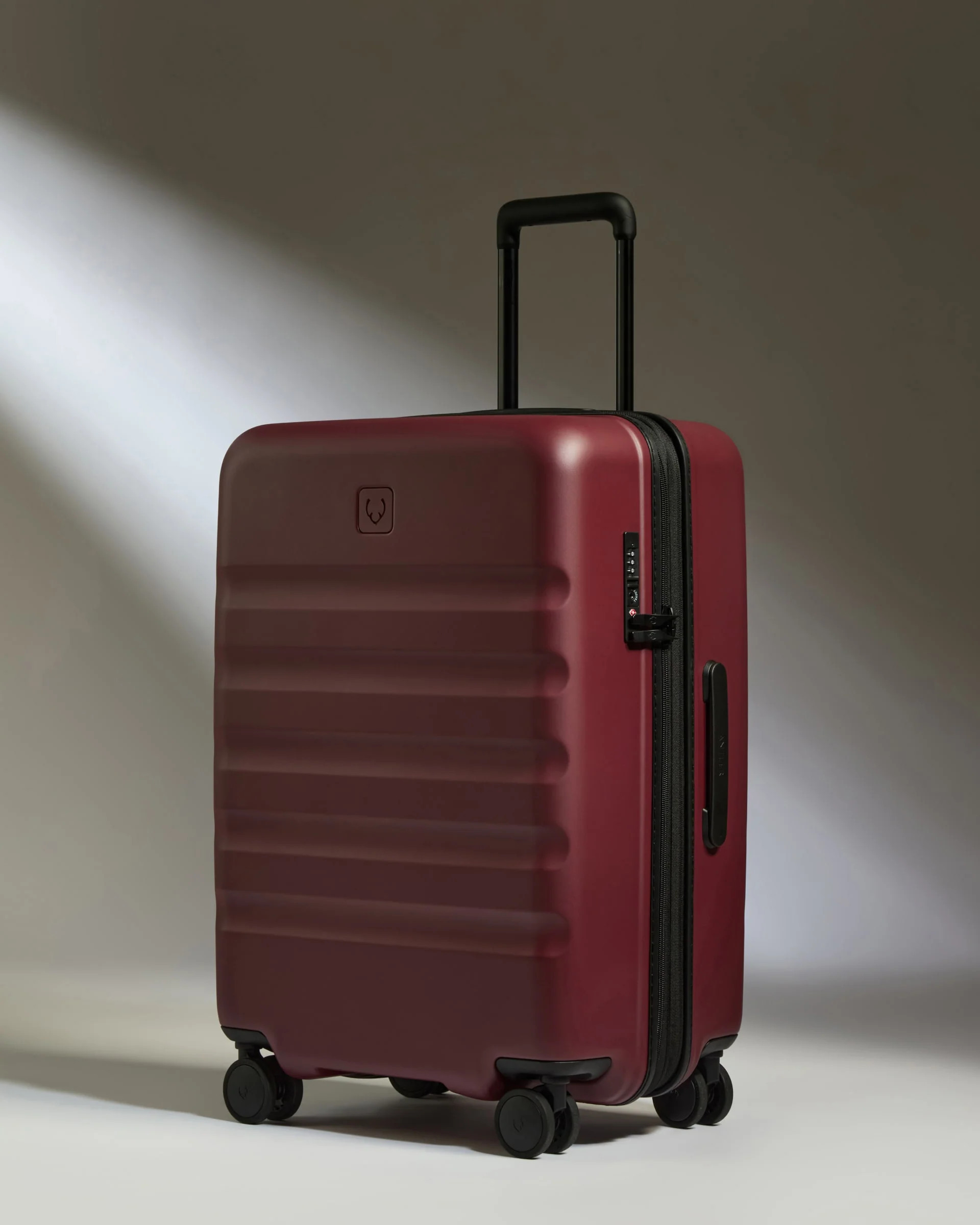 Antler Medium Luggage In Cedar Red - Icon Stripe Size: 45.5" x 66" x 30 | Antler USA