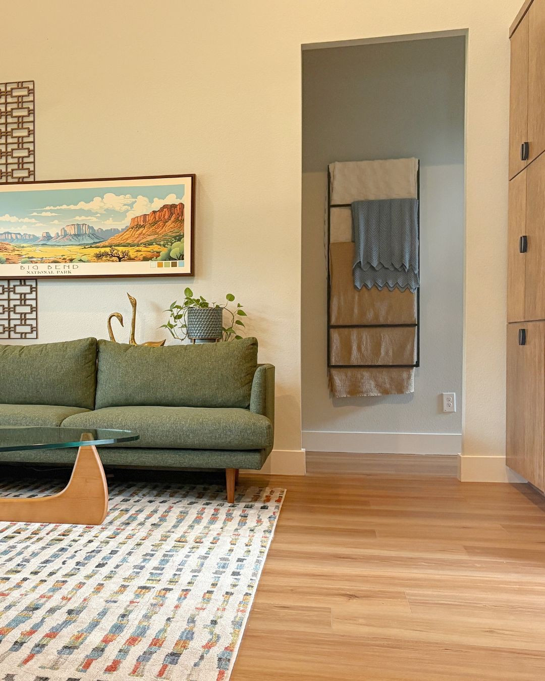 My living room had zero places to store blankets, on the wall or otherwise. So I added this blanket rack to the hallway instead. Still easily available for blanket emergencies, and slim enough to not block the walkway. 

#blanketladder #blanketstorage #homedecor #livingroom 

#LTKHome