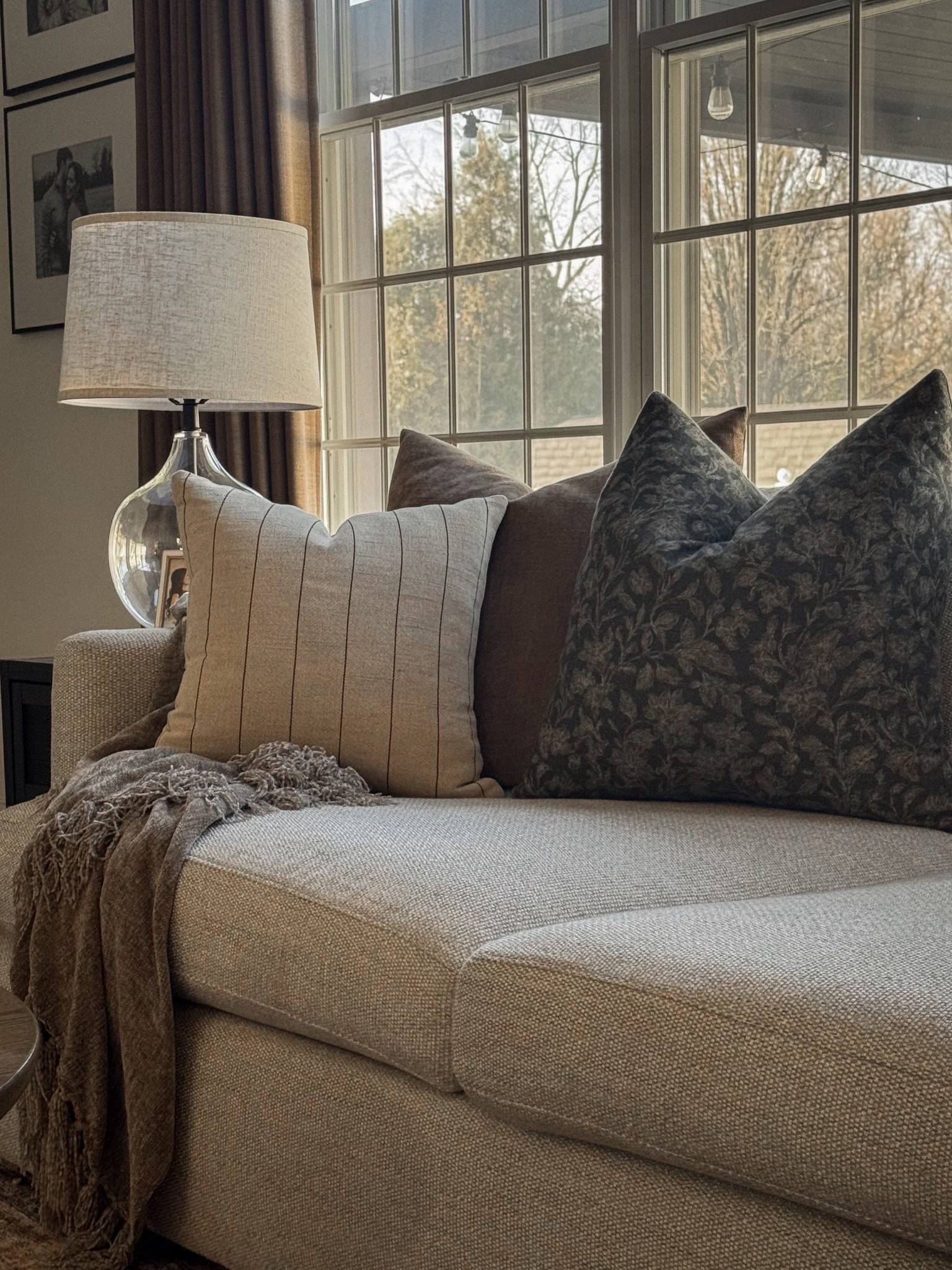 This throw pillow combo is my current favorite thing in the living room right now. 

Living room decor, throw pillow combo, affordable throw pillows, pillow covers, sectional sofa, living room sofa, throw blanket, living room lamp, table lamp, end table, Amazon curtains