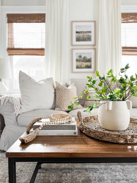 Neutral Spring Living Room. Coffee table styling. 

#LTKSeasonal #LTKhome #LTKstyletip