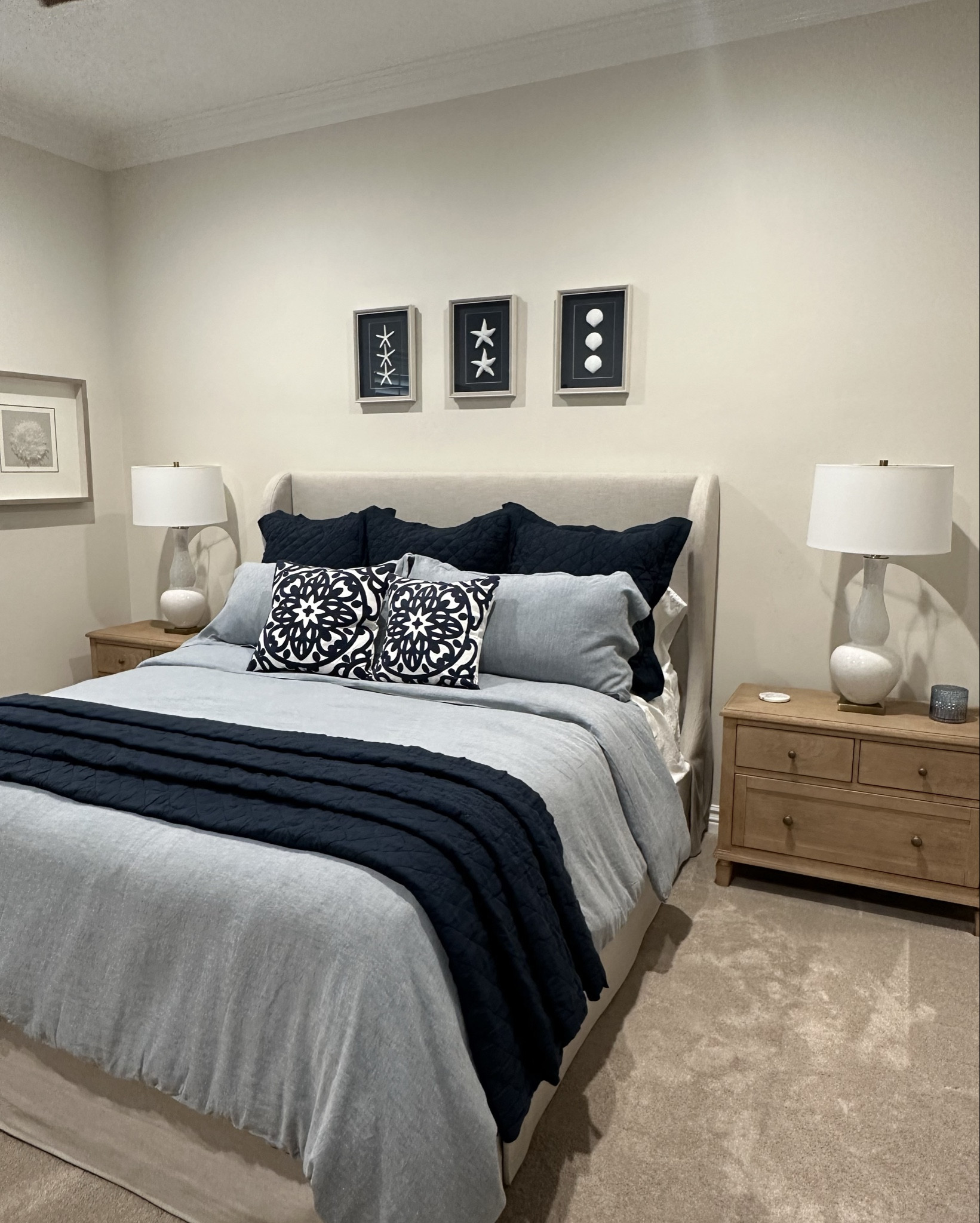 Inviting Guest Bedroom in creams and blues.  Wingback upholstered cal king bed. Pottery Barn nightstands and dresser. 



#lauraporterdesigns #potterybarn #wayfair #lampsplus #guestbedroom #beachbedroom #bluebedding #upholsteredbed #masterbedroom 

#LTKHome