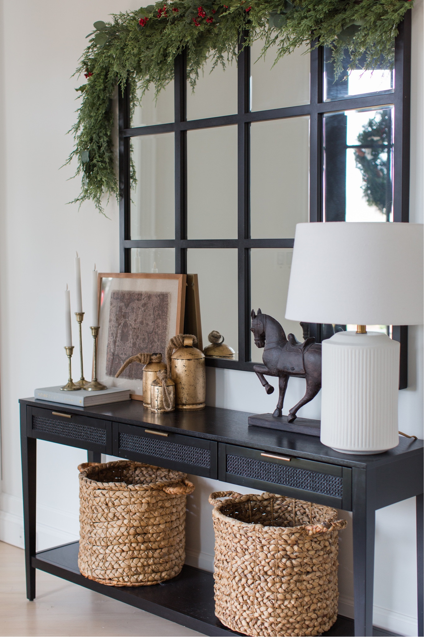 Our black console table is back in stock! And decked out with holiday decor 

#LTKsalealert #LTKhome #LTKHoliday