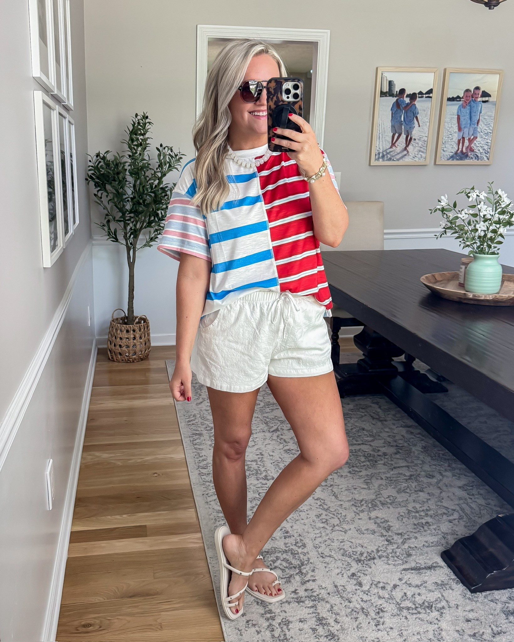 This patriotic tee is such a fun one for summer 🇺🇸 I love the mixed stripe detail and oversized fit paired with easy white shorts for a casual look that still feels festive. Perfect for backyard BBQs, lake days, or all the Fourth of July plans.

patriotic outfit, fourth of july outfit, red white and blue style, casual summer outfit, comfy patriotic tee, summer shorts outfit, memorial day outfit, americana fashion, cute holiday outfit, oversized tee outfit, amazon summer fashion, casual everyday style, lovelylifestyling

#LTKSeasonal #LTKTravel #LTKOver40