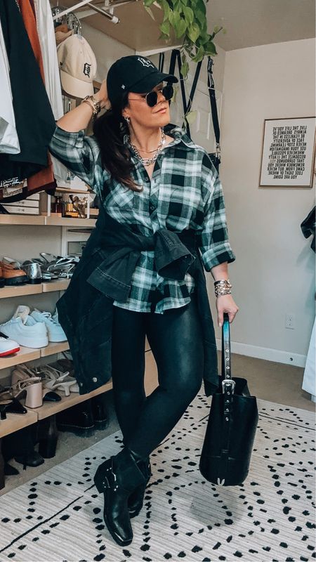 Midsize fall outfit idea - flannel plaid button down top wearing an xl (it has pockets)
Faux leather leggings are a 1x petite (size up one) I am 5’6 for reference! CODE: TARYNTRULYXSPANX 
Moto boots 
Boyfriend black denim jacket large 
Bucket bag
Mixed metal accessories 

#LTKstyletip #LTKmidsize #LTKSeasonal