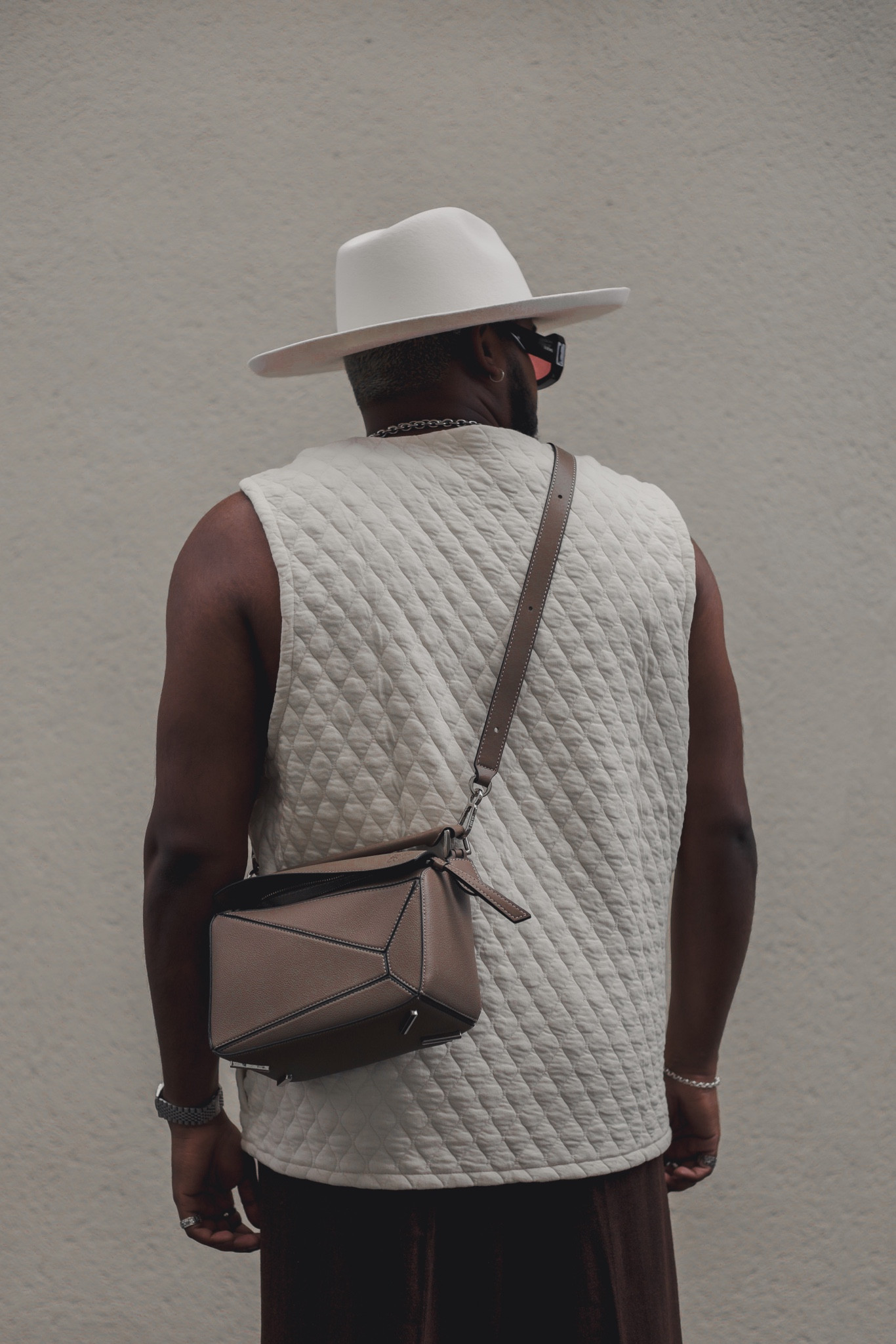 Elevating my summer wardrobe with timeless pieces and impeccable style 🌴. 

Breakdown of the complete outfit:

White hat is from the brand @lackof colour This hat is one of my go to pieces when it comes to elevating my simple classy outfits, it just stands out and trust me, this is definitely a head turner of a piece.

The vest is from @asos , got it for a steal for summer sale, love the detail and design and fit on it.

Trousers are from @asos , the style of the trousers are, wide leg brown trousers, as you know me I love a good pair of wide leg trousers they make any outfit look amazing and are good to play around with proportions of the whole fit.

And lastly the shoes are from @off-white These have been my go to shoes for the longest l, I have 2 pairs of these now. They are super comfortable and highly recommend you getting a pair, it might be a bit pricy for some but it’s definitely worth every penny.

#LTKFind #LTKmens #LTKfit