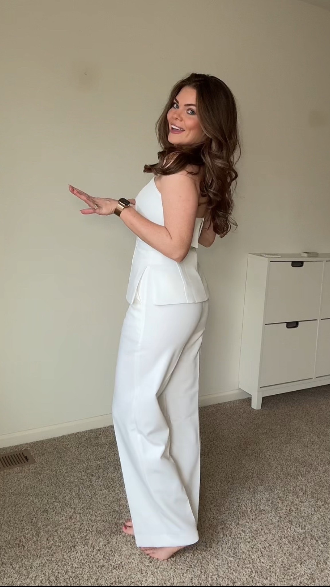 White strapless tube top and white straight leg trouser 

#LTKSeasonal #LTKWorkwear #LTKWedding