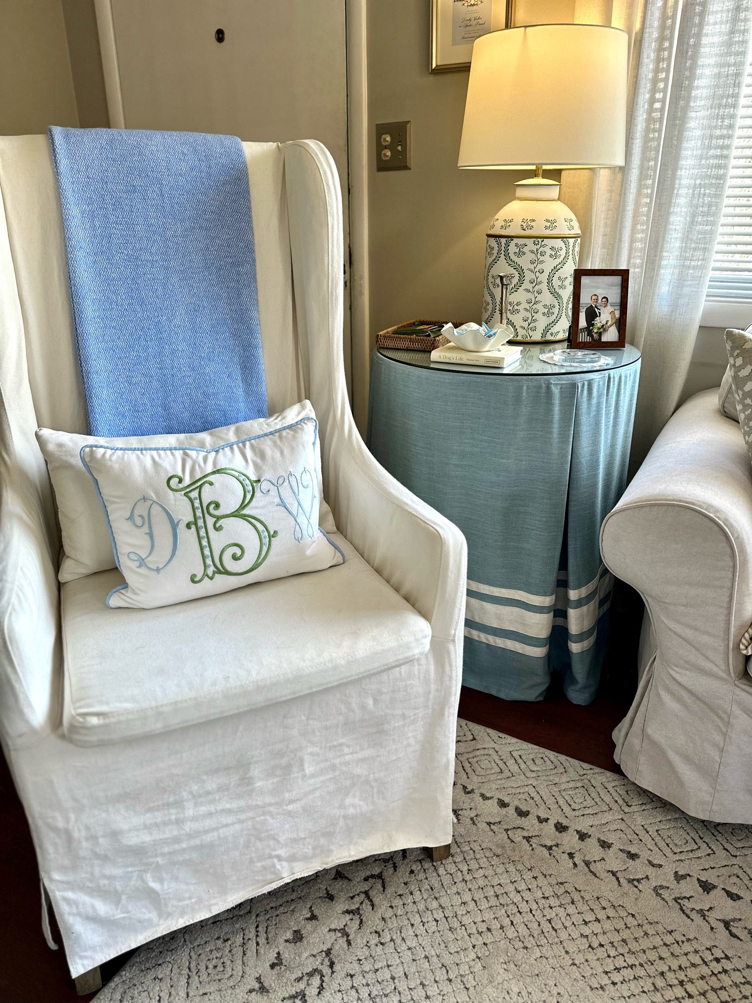 Living room side chair with monogram pillow and skirted table  

Our living room so far feels pretty finished, but there are still some updates I’d like to make! Here’s a look at how it looks now to give you an idea of the space we’re working with and the different vignettes set up in the room!

First house, living room, blue and green decor, southern traditional, antique furniture, smaximalist, southern maximalism, affordable home decor, interior design hack, cane furniture, faux bamboo furniture, ikea sofa, skirted table

#LTKfindsunder100 #LTKhome