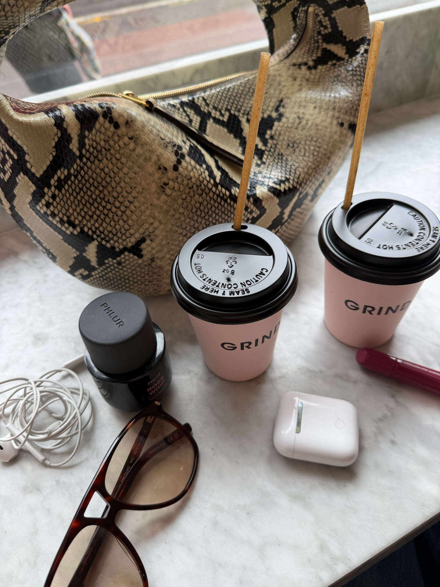 Rhode balm, Khaite bag, ysl sunglasses, phlur 

#LTKluxury #LTKbag #LTKbeauty