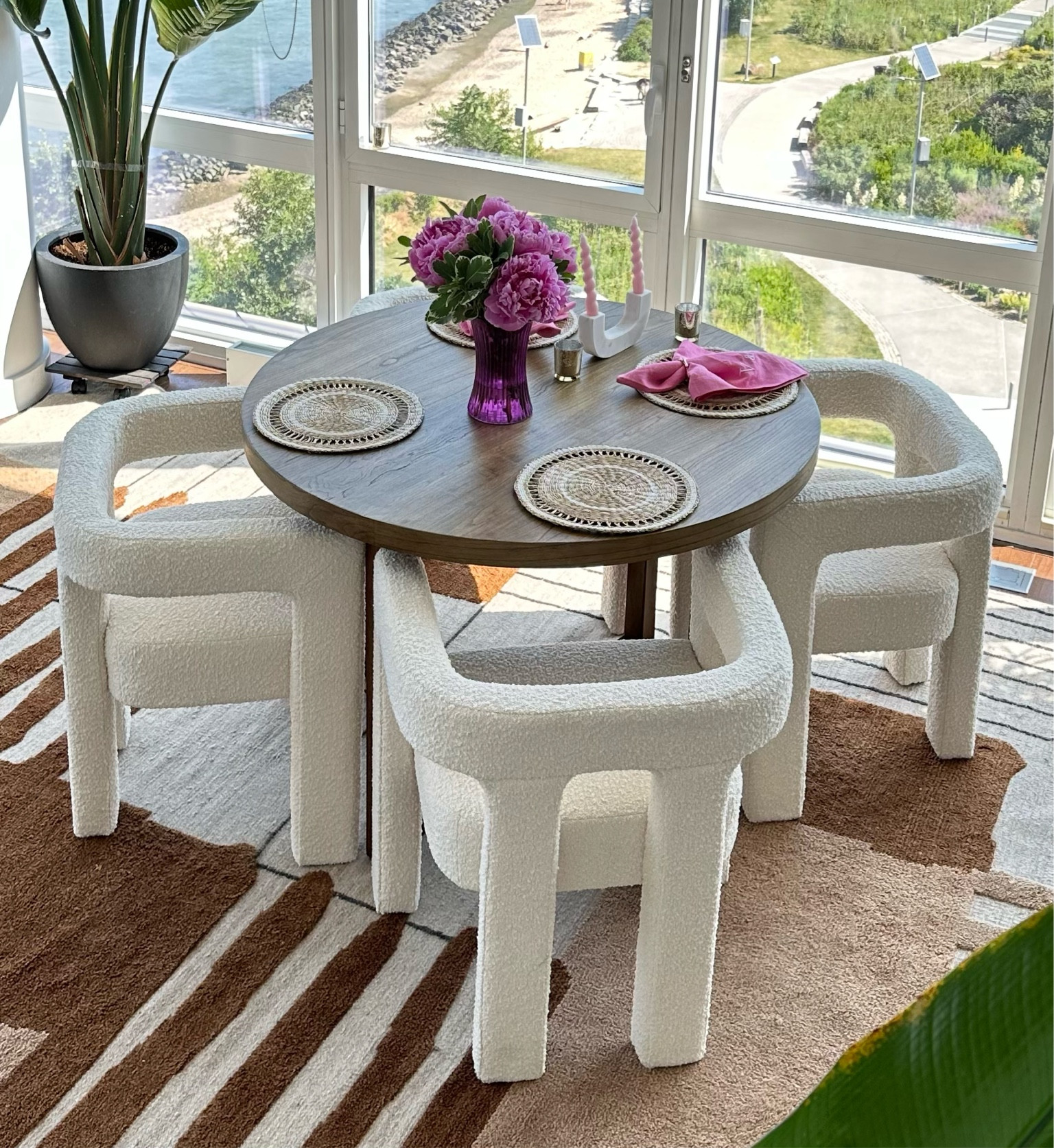 Chic small dining table space with boucle chairs. Table is under $200 from target! 


#LTKunder100 #LTKFind #LTKstyletip