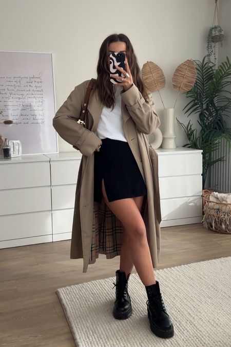 Classic trench coat styled with & other stories relaxed fit tshirt, black split mini skirt and dr marten chunky boots. JW pei joy bag in brown finishes the look! 
