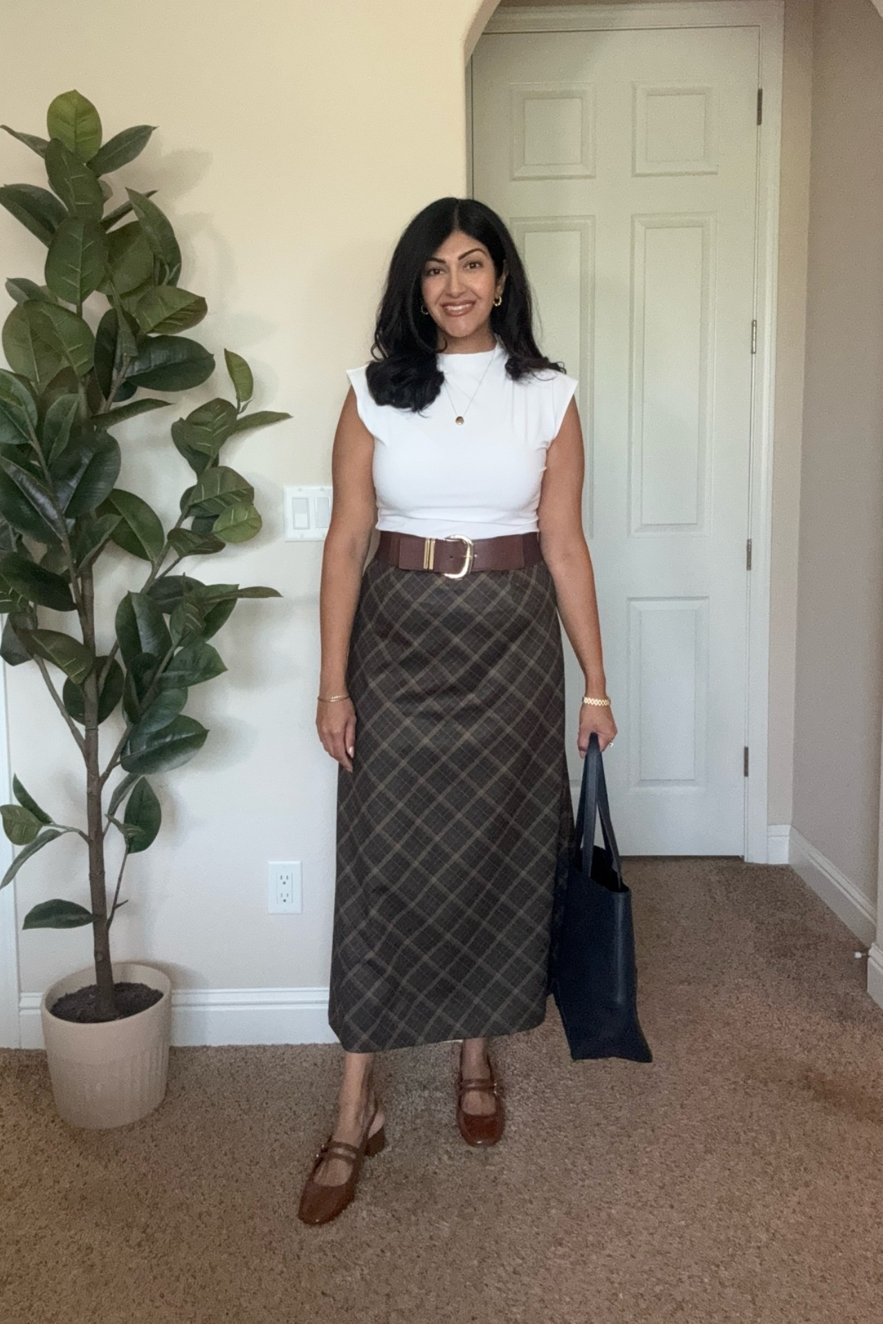 Ralph Lauren-inspired fall style 🤎🍂

A plaid skirt, crisp white top, brown belt and Mary Jane heels make the perfect elevated transitional look for the office, meetings or fall plans. Classic, polished and easy to rewear all season.

SEO keywords: transitional fall outfit, Ralph Lauren inspired outfit, plaid skirt outfit, fall workwear, preppy fall style, Mary Jane heels, office outfit, business casual fall outfit, midsize fall style

#FallOutfit #FallWorkwear #PreppyStyle #OfficeStyle #workwear

#LTKWorkwear #LTKMidsize #LTKSeasonal