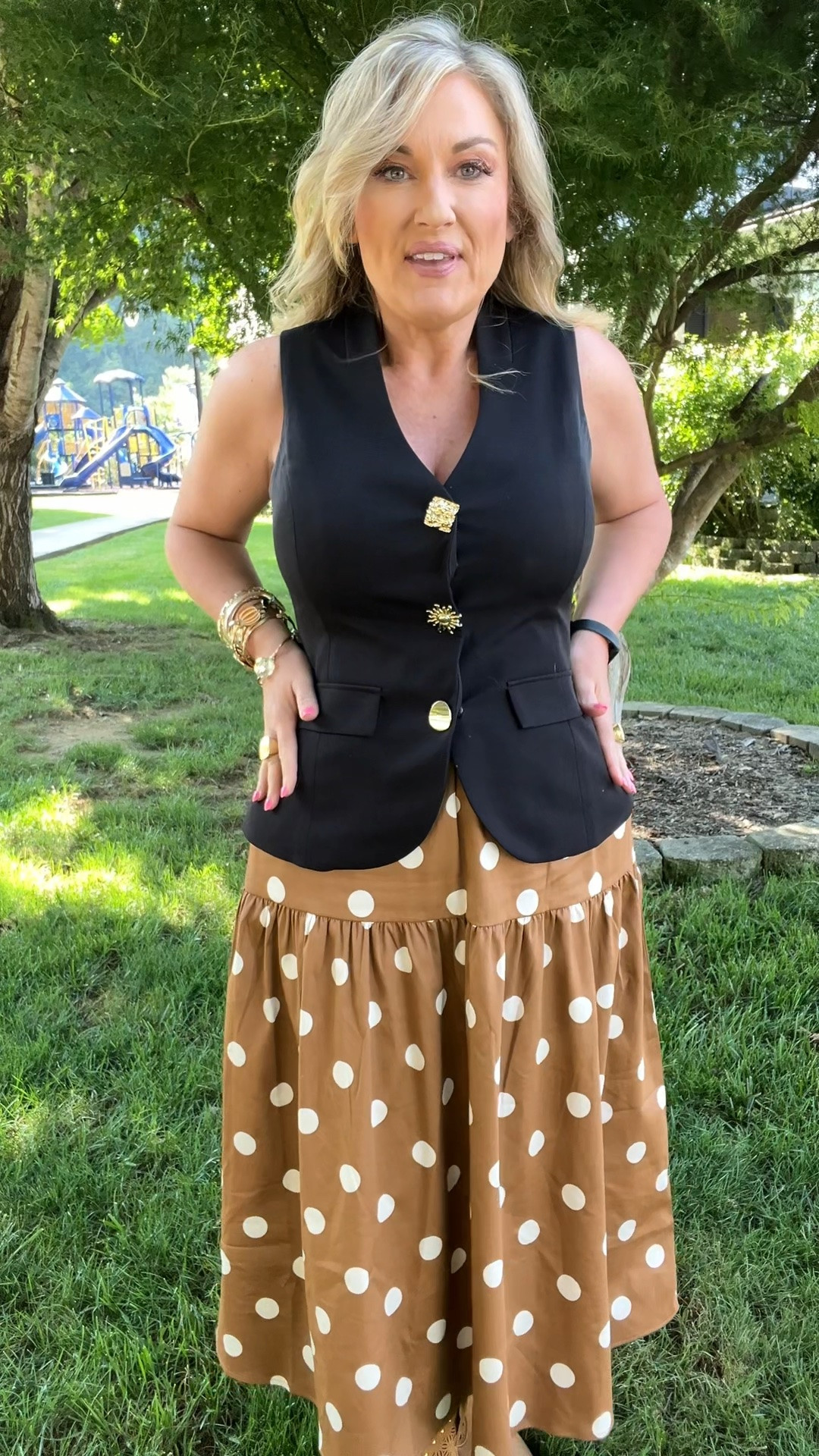 Wearing a medium
In both the fitted vest with snap button closure and the polka dot midi skirt.

#LTKootd #LTKMidsize #LTKOver40