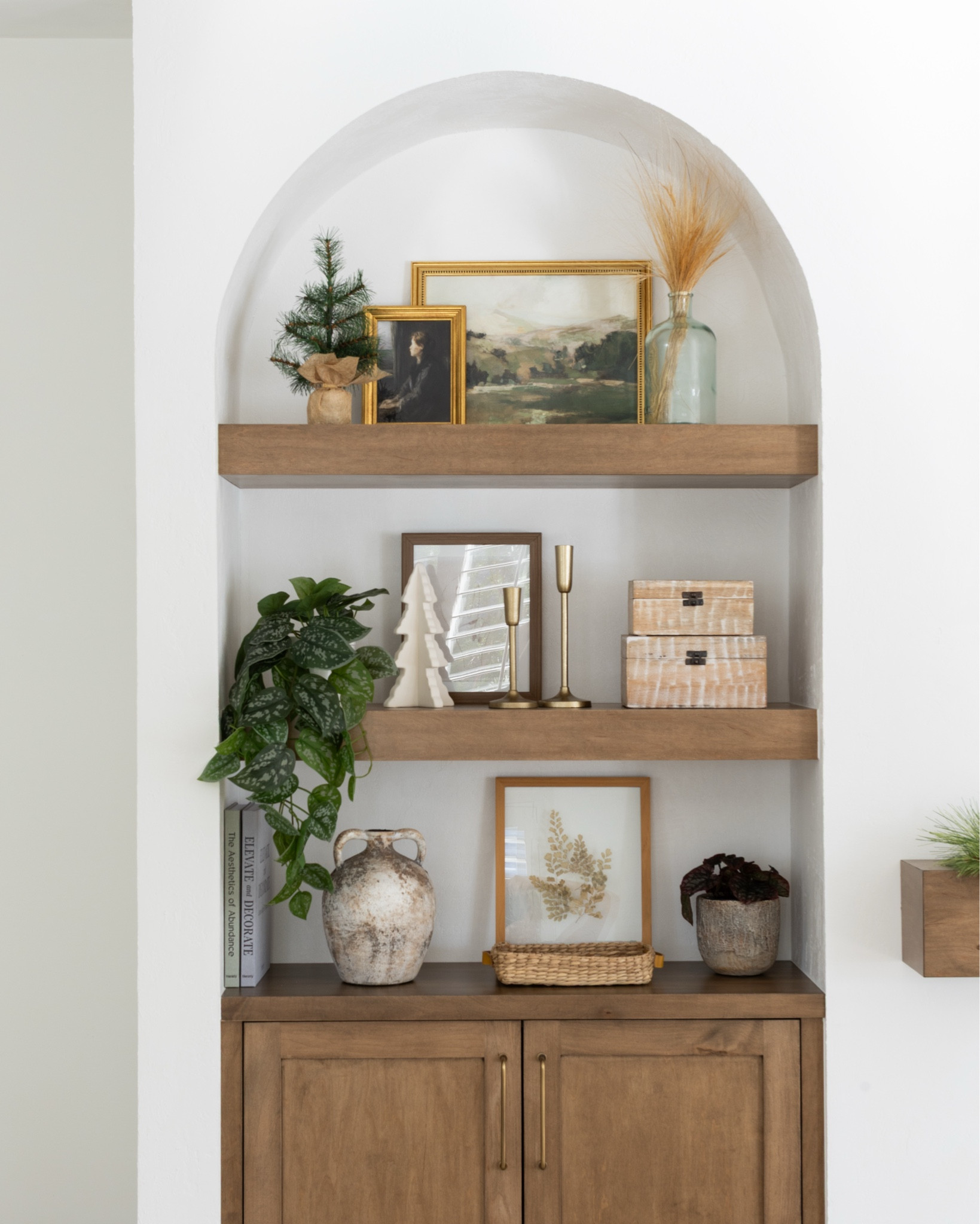 Our living room open shelves! Grab a similar look and earthy finds! Christmas in our living room is minimal and neutral!

#LTKHoliday #LTKFindsUnder100 #LTKHome
