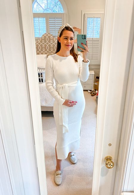 Loving this white midi sweater dress from Amazon! Nice thick material makes for a flattering fit. Bump friendly! *Wearing a Medium to accommodate the bump (would usually be a small). 

Sweater dress. Amazon find. Amazon dress. Long sleeve dress. Midi dress. Holiday outfit. Pregnant outfit. Maternity outfit. Buckle mules. Under 50. Knot headband. 

#LTKbump #LTKHoliday #LTKSeasonal