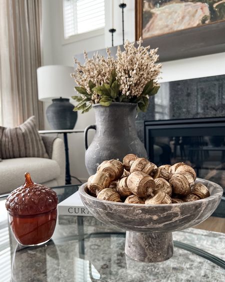 Coffee table styling for fall. 

Decor bowls, wood beads, fall candles, vintage jug vases, pottery vases, fall stems, lamps, accent tables  

#LTKSeasonal #LTKstyletip #LTKhome