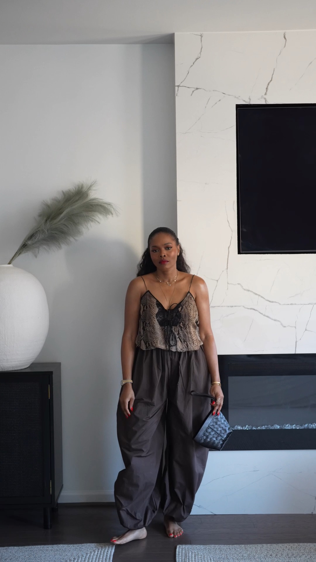 Snake print cami + chocolate parachute pants + woven clutch = the only math that matters this season. @ASOS @Zara (Note: Bag is Bottega but I linked some affordable alternatives)

#LTKTall #LTKFestival #LTKootd