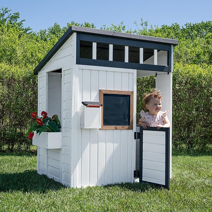 Backyard Discovery Caraway Cottage White Cedar Wooden Kids Playhouse with Play Kitchen, Chalkboar... | Amazon (US)