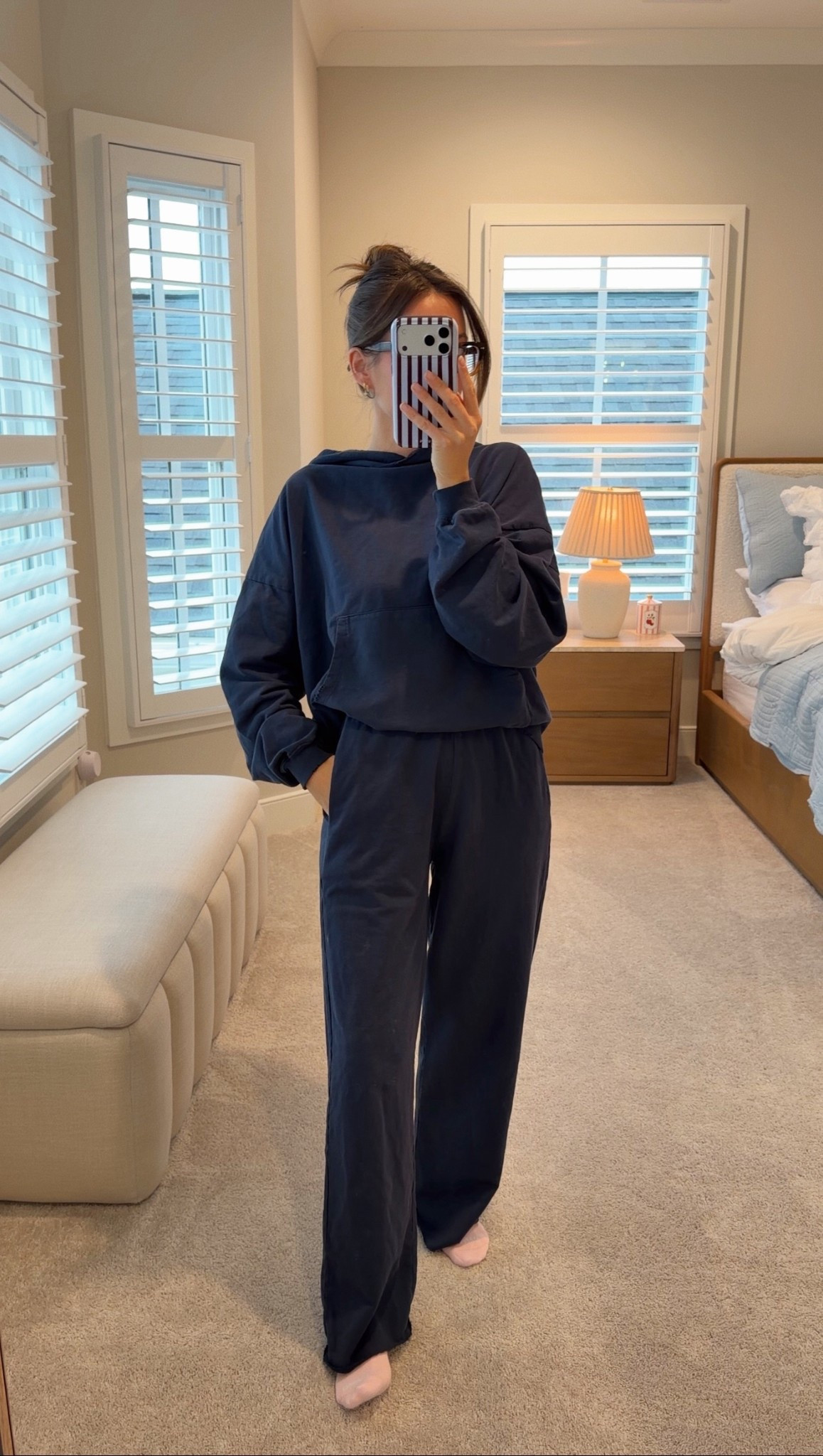 If you want a perfectly oversized without drowning in fabric lounge set, this Jean & June one is it. Boxy, flattering fit with the dreamiest balloon sleeve and a double-lined hood. The French terry is 100% cotton, pre-shrunk, and has that vintage-soft/worn in feel!!

The pants are mid-rise with the coziest lined pockets and a relaxed fit that makes the whole set feel elevated but still comfy.

Wearing small in both :) linking my socks, glasses & phone case too! 

#LTKFindsUnder100 #LTKdayinmylife #LTKTravel