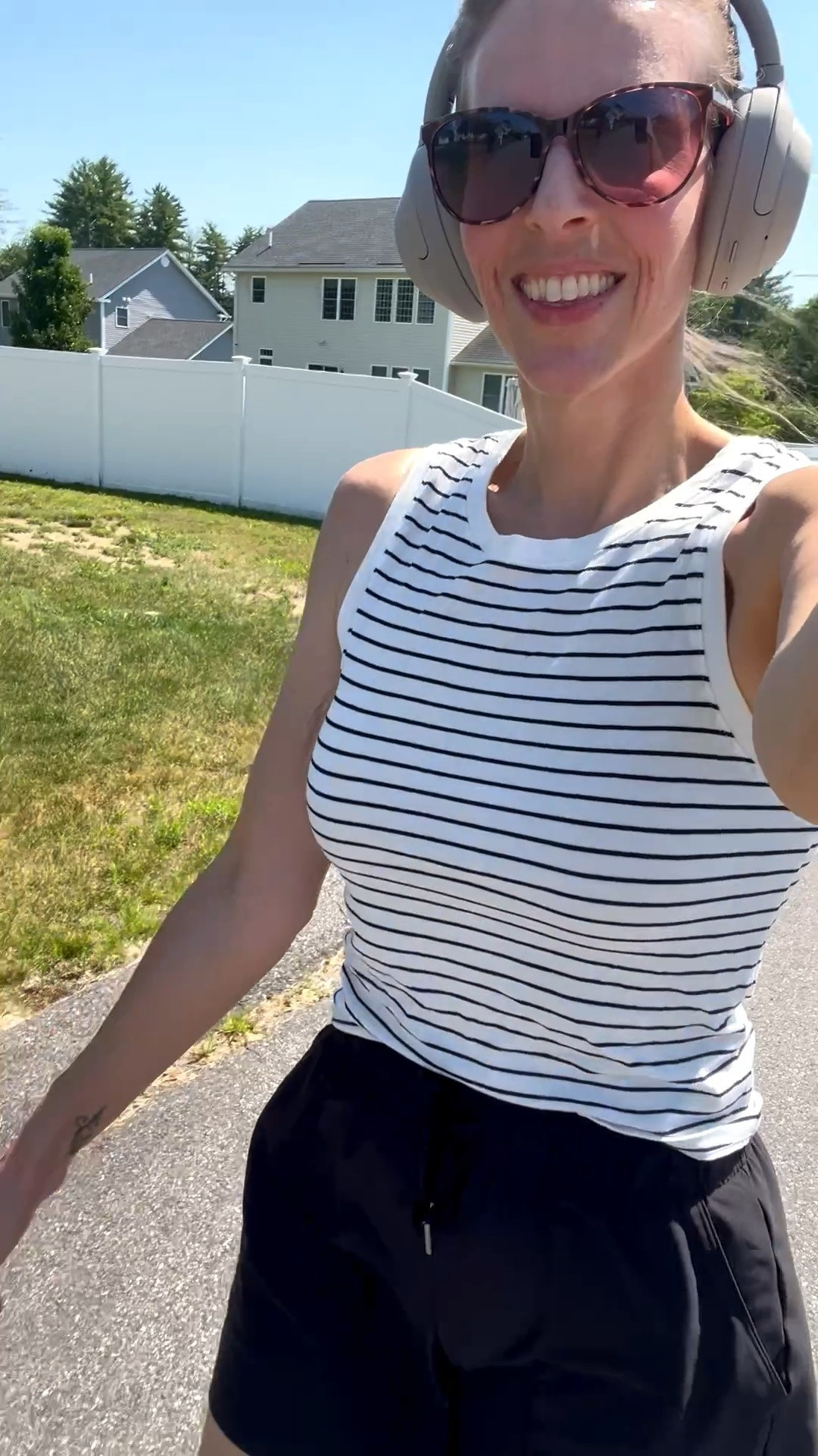 💪🚶‍♀️ Power walking in a tank and athletic shorts. The perfect activewear look for workouts, walks, and everyday summer style. ☀️🤍

#LTKOver40 #LTKActive