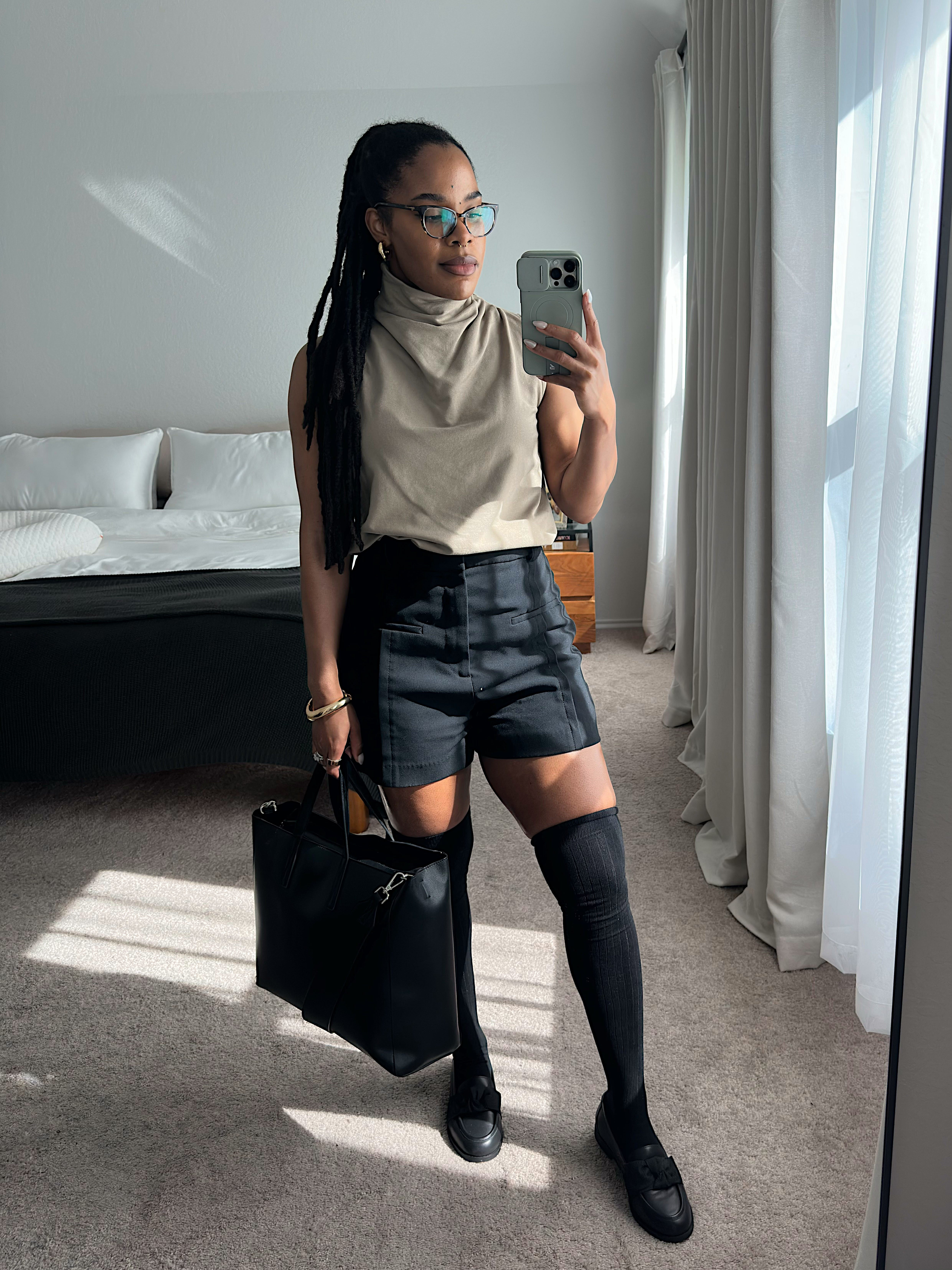 Sleeveless Funnel Neck Top +Bow Loafers || spring outfits // spring outfit ideas // tailored black shorts // elevated casual outfits // casual classy outfits // spring style inspo // sleeveless funnel neck top // laptop bag // work bag // otk socks

#LTKootd
