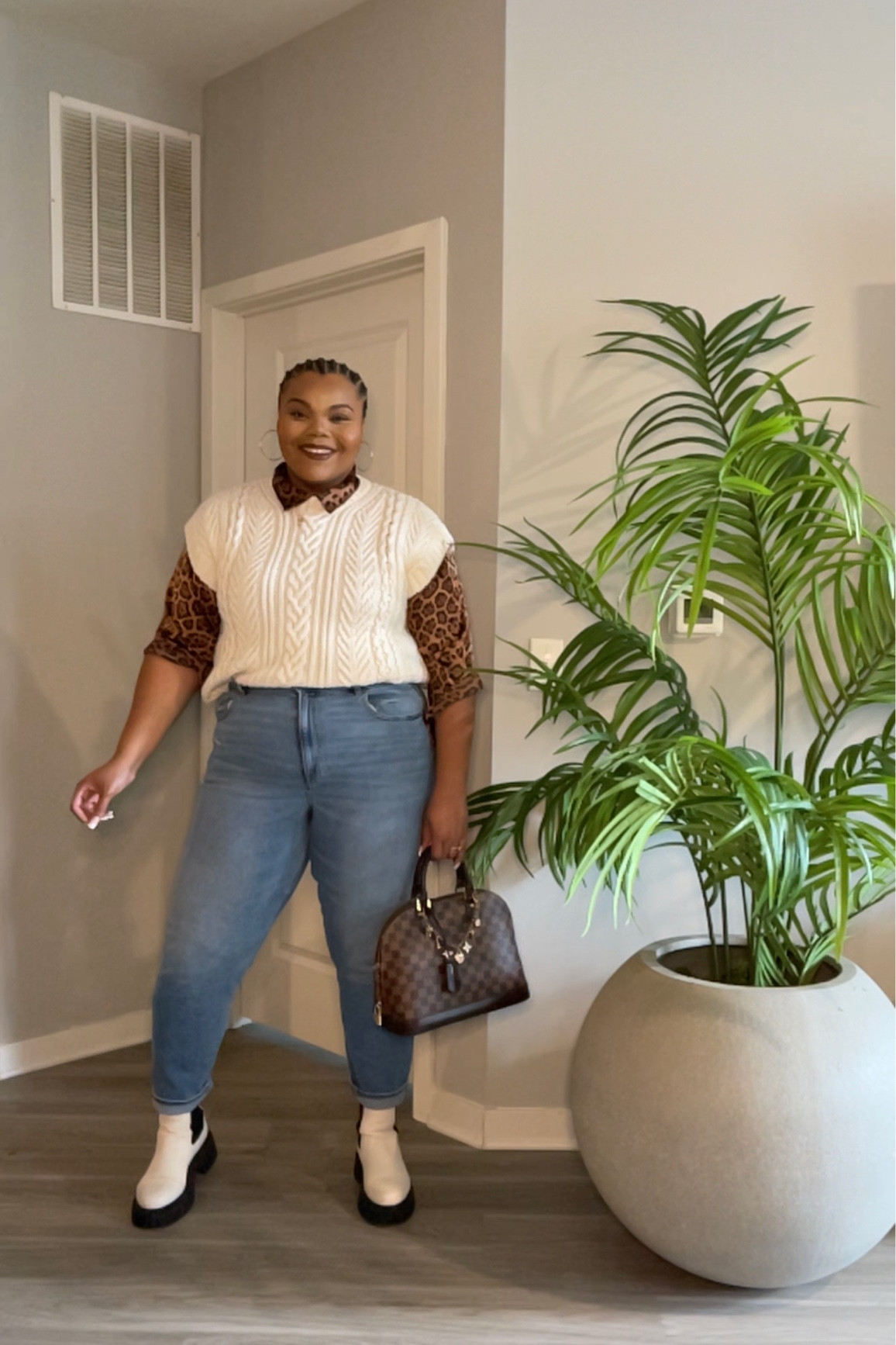 Cute and easy everyday plus size fashion and style. Get into this mom jeans outfit! The white combat boots style perfectly with the cable knit vest!

#LTKstyletip #LTKcurves