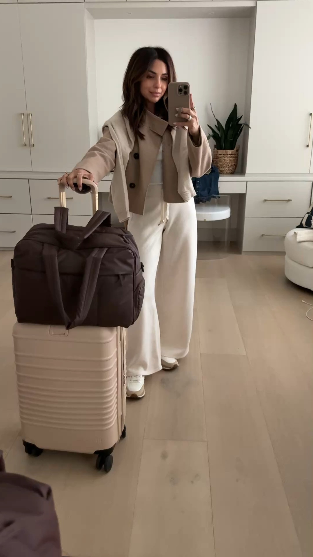 Today's travel outfit ✈️ I'm always in my Spanx sets, and I love to mix and match the pants with different tops to stay comfy! I'm in the XS petite length, XS jacket & my slip on sneakers (TTS) are a must! My carry on & duffel combo are ELITE i packed so much omg 

#LTKOver40 #LTKPetite #LTKTravel