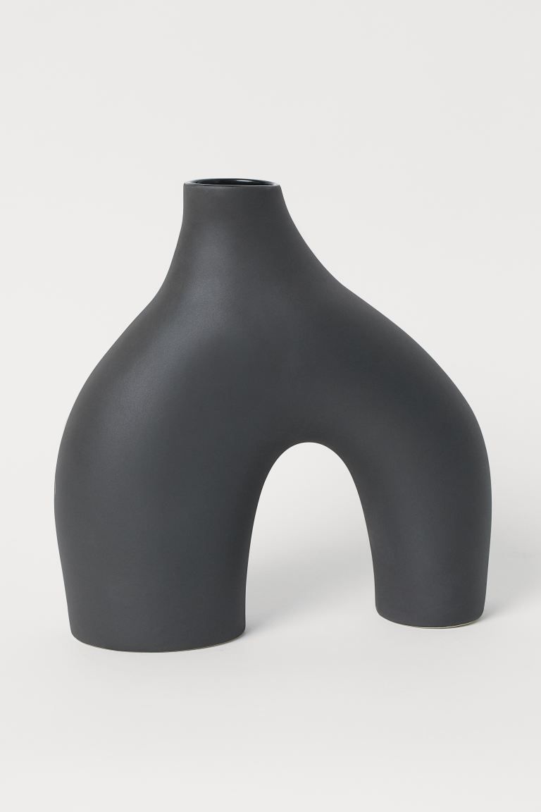Large vase in glazed stoneware with a soft, irregular shape and two legs with different widths. D... | H&M (US + CA)