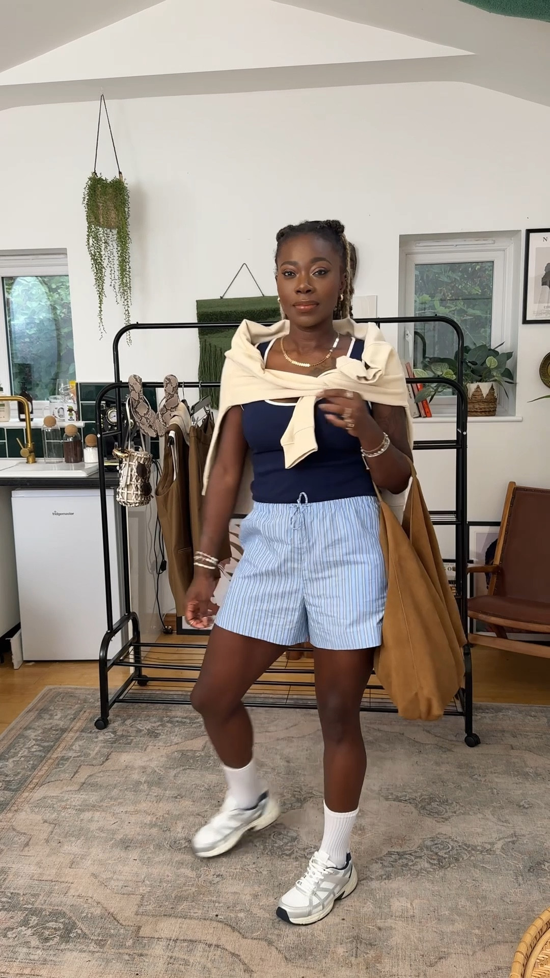 The boxer shorts trend has officially moved from lounge to street style, and I’m here for it 🙌🏾

These striped drawstring shorts are super comfy, breathable, and so easy to style.
Paired with a navy tank top, trainers, and a neutral sweatshirt thrown over your shoulders, it’s the perfect casual summer outfit formula. Add a slouch suede bag for texture + minimal jewellery and you’ve got elevated athleisure without even trying.

#BoxerShortsTrend #ltkmum #athleisure

#LTKeurope #LTKuk #LTKfitness