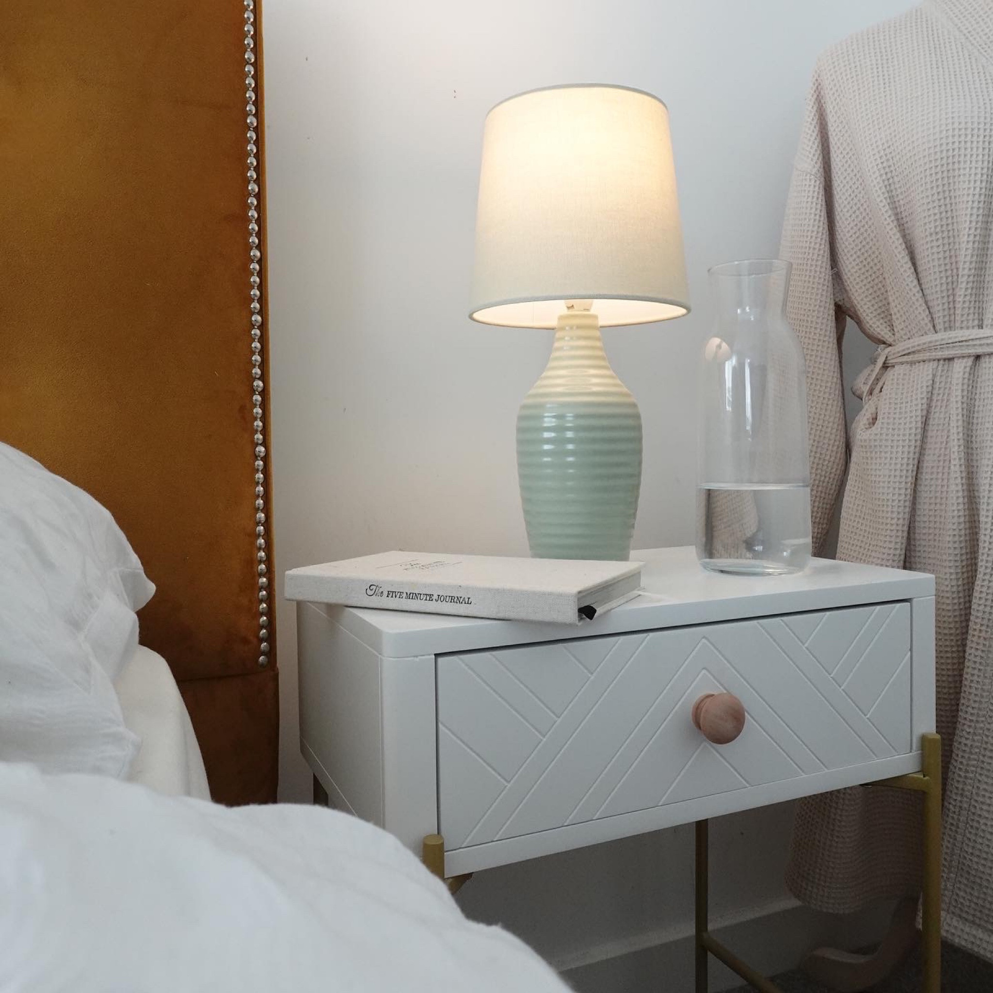 Simple small bedside lamp. Perfect subtle shade of green that goes with most colour schemes 

#LTKFind #LTKhome #LTKunder100